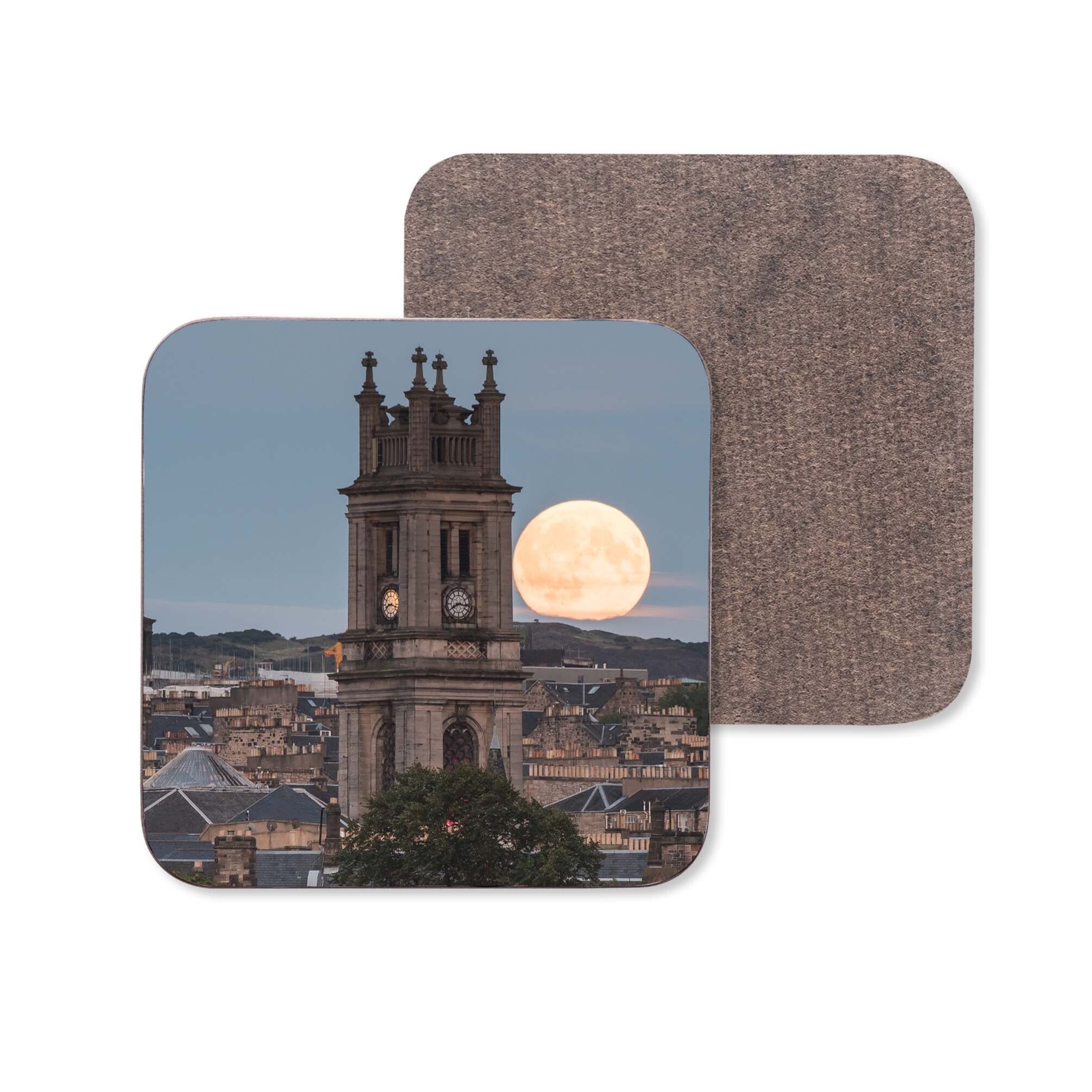 An image St Stephen's Church with a full moon beside it on a coaster.