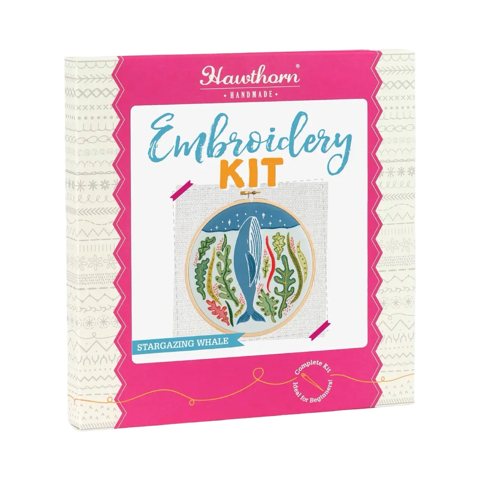 This craft kit teaches you to embroider a hoop with a whale surrounded by underwater plants pointing towards a sky full of stars.