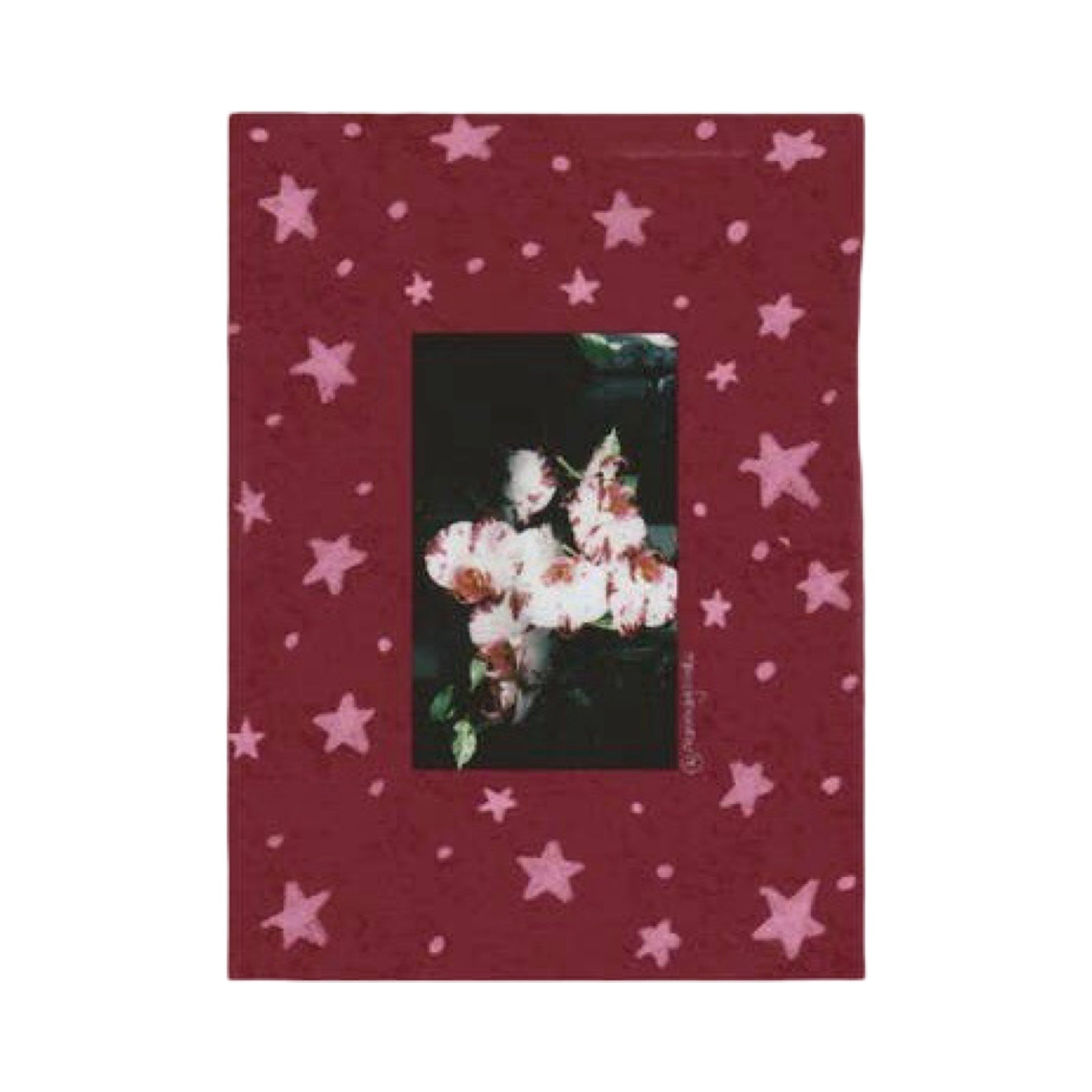 A rectangular frame featuring a pattern of light pink stars of various sizes and a central rectangular inset photo of white flowers with green leaves, shown flat against a white background.