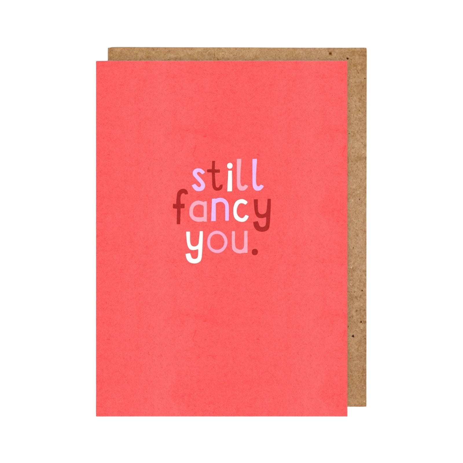 typographical card featuring the text 'still fancy you' written in red, pink and white against a red background.