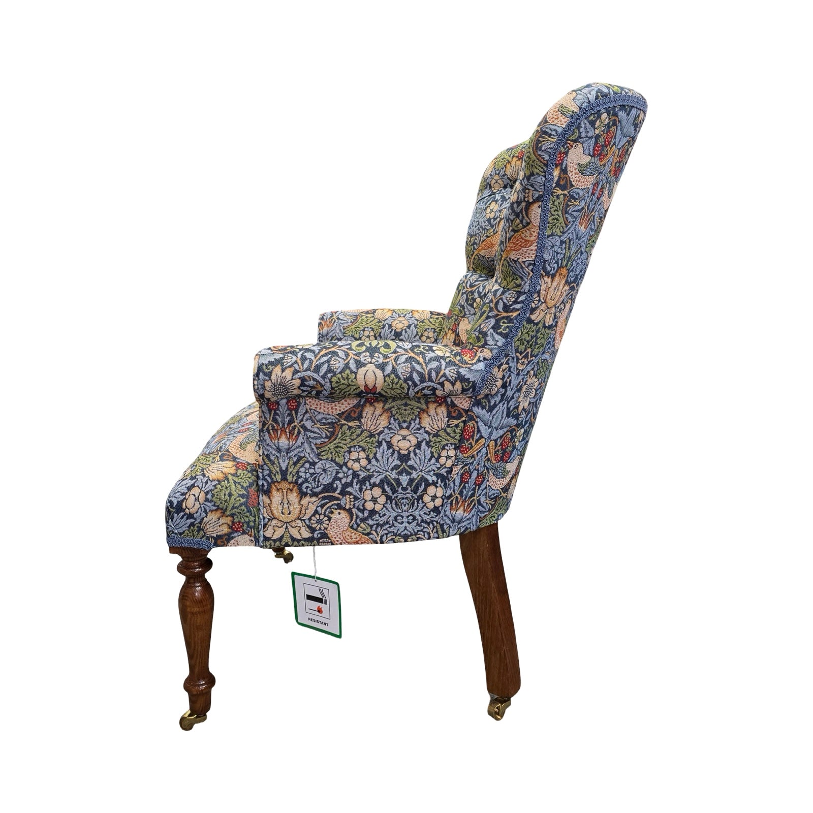 Floral patterned armchair on a white background.