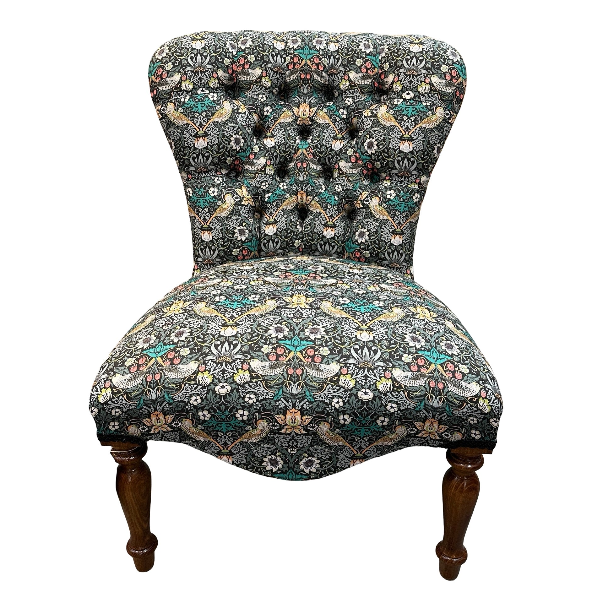 Decorative chair with floral pattern on a white background.