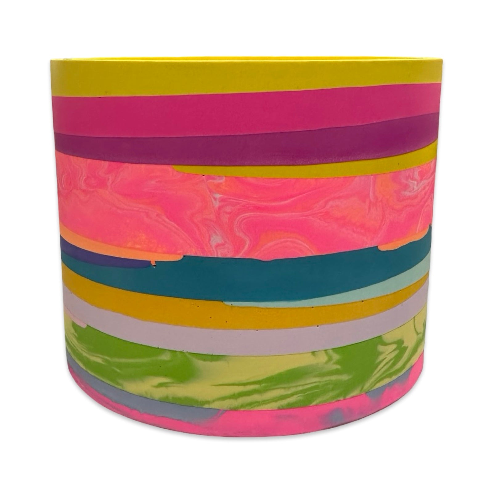 Colorful striped planter with a white background.