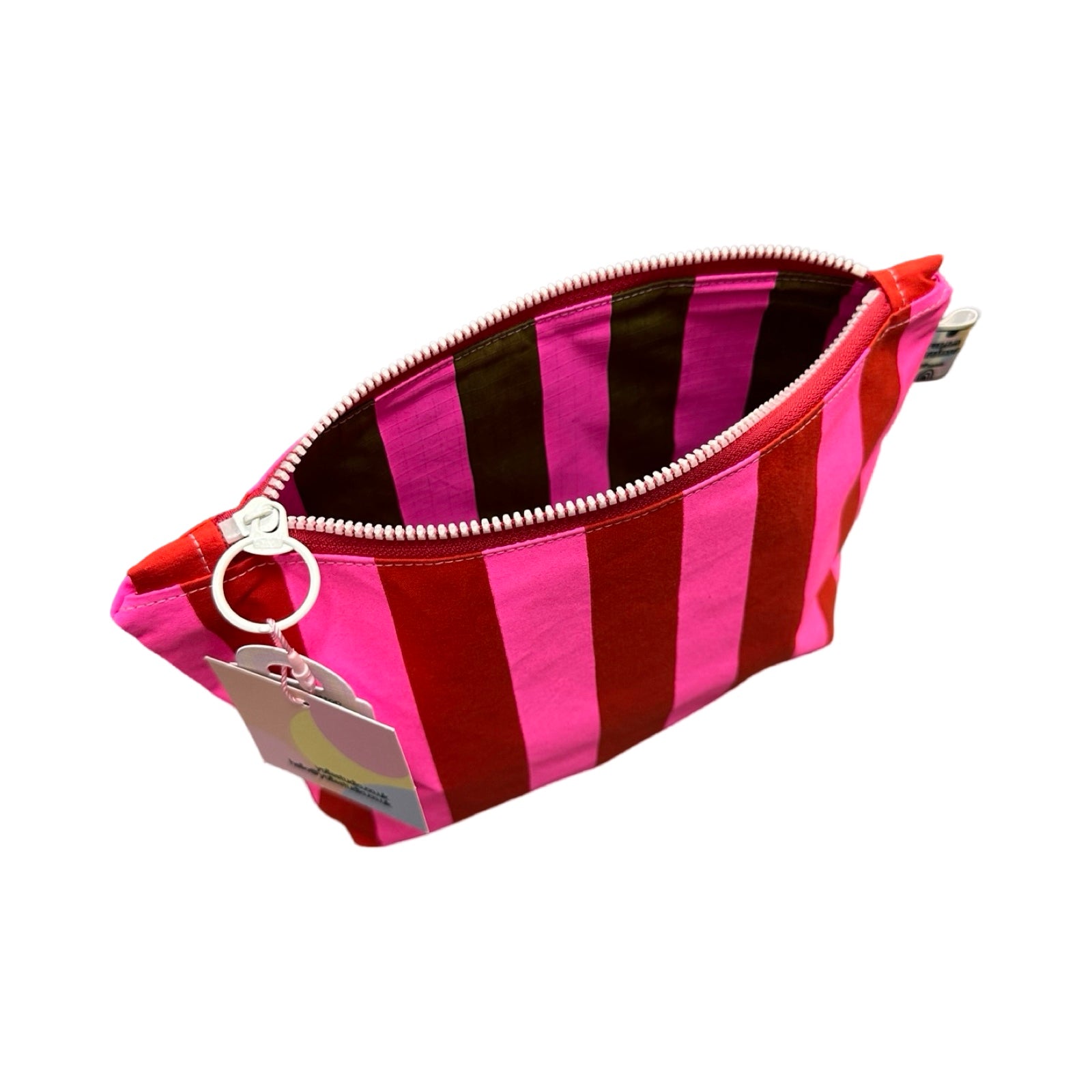 A red and pink striped cosmetic bag open showing pink and grey striped lining.