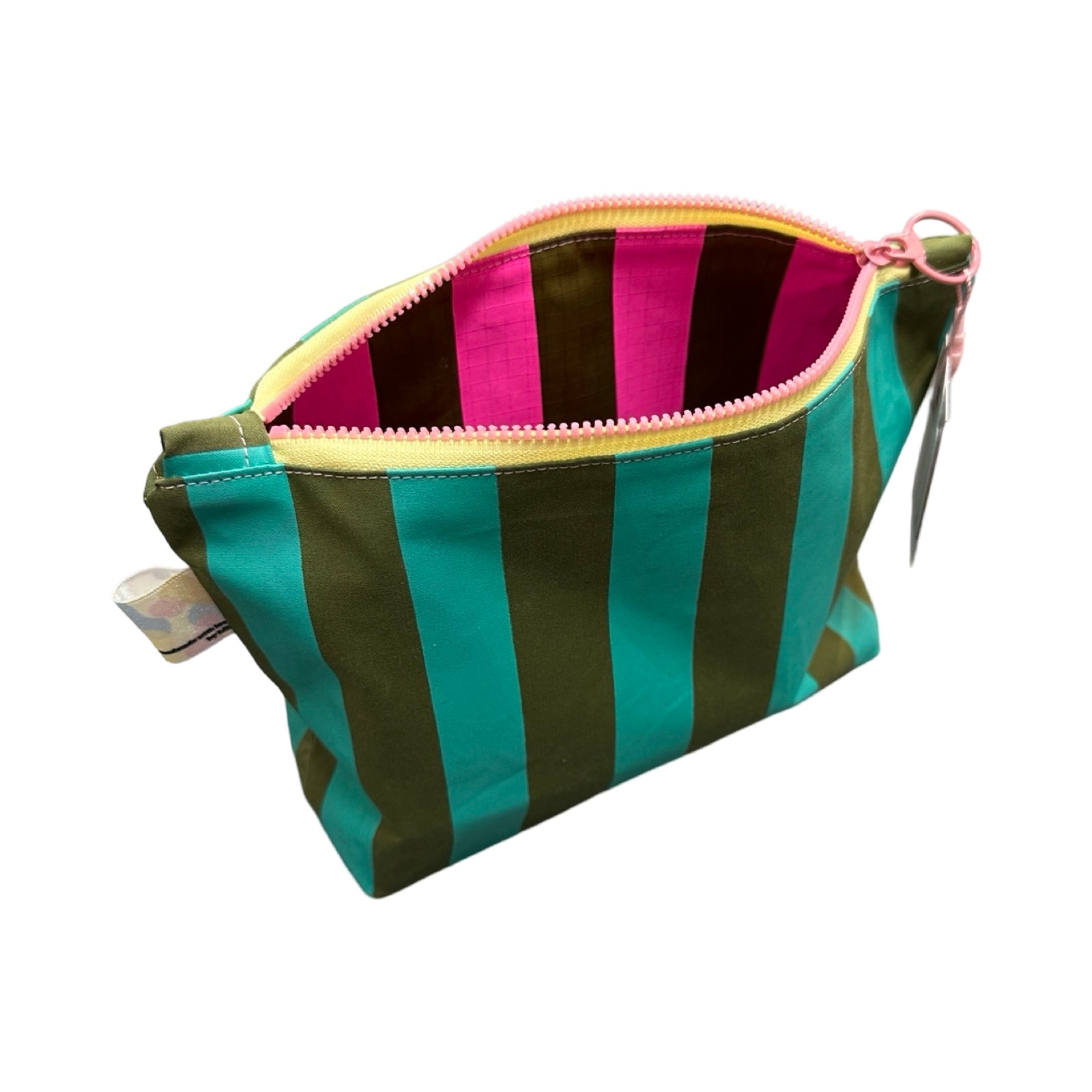 A green and turquoise striped cosmetic bag open showing pink and grey striped lining.