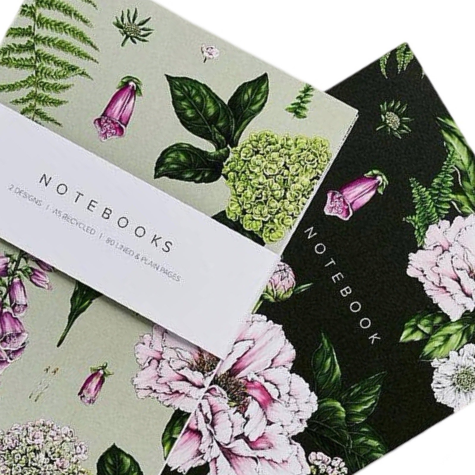 Notebooks with floral and botanical designs on a white background.