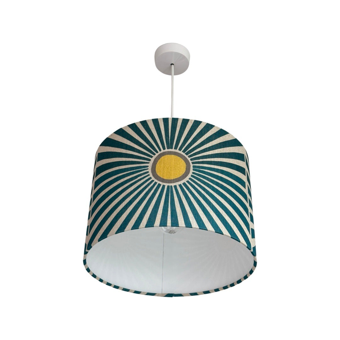 Drum lampshade in cream with yellow and grey suns and navy sunbeams
