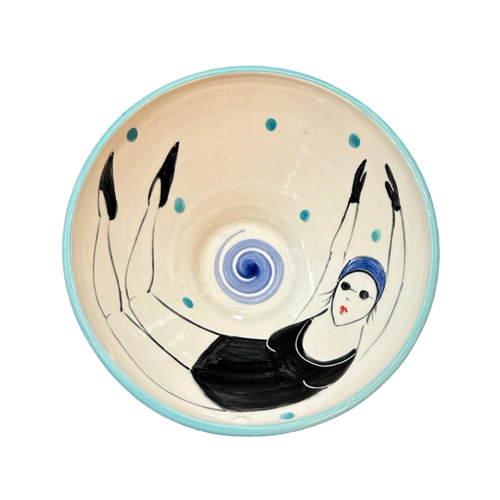 A cream ceramic cereal bowl with a female wild swimmer wearings a black swimsuit and a blue swim cap.