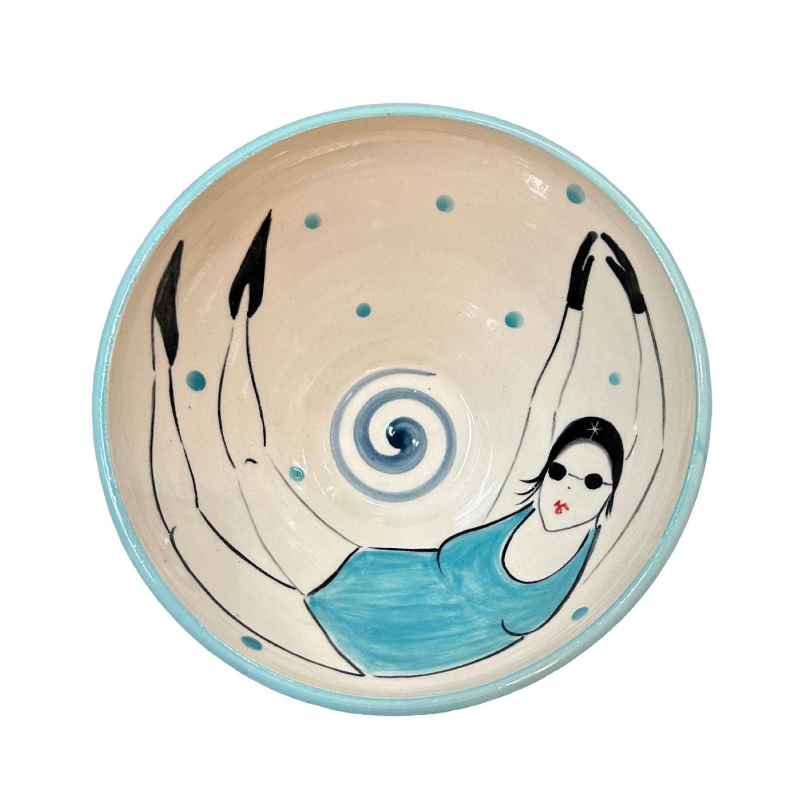 A cream ceramic cereal bowl with a female wild swimmer wearings a turquoise swimsuit and a black swim cap.