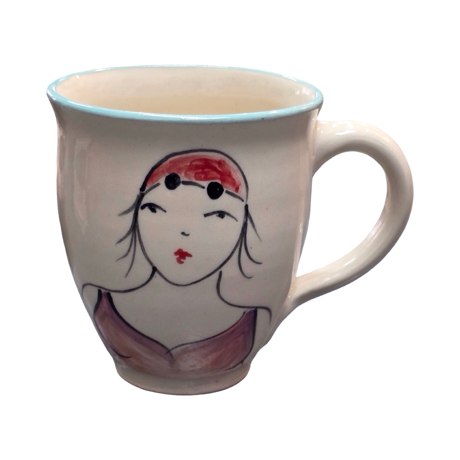 White mug with a pink face design on a white background.