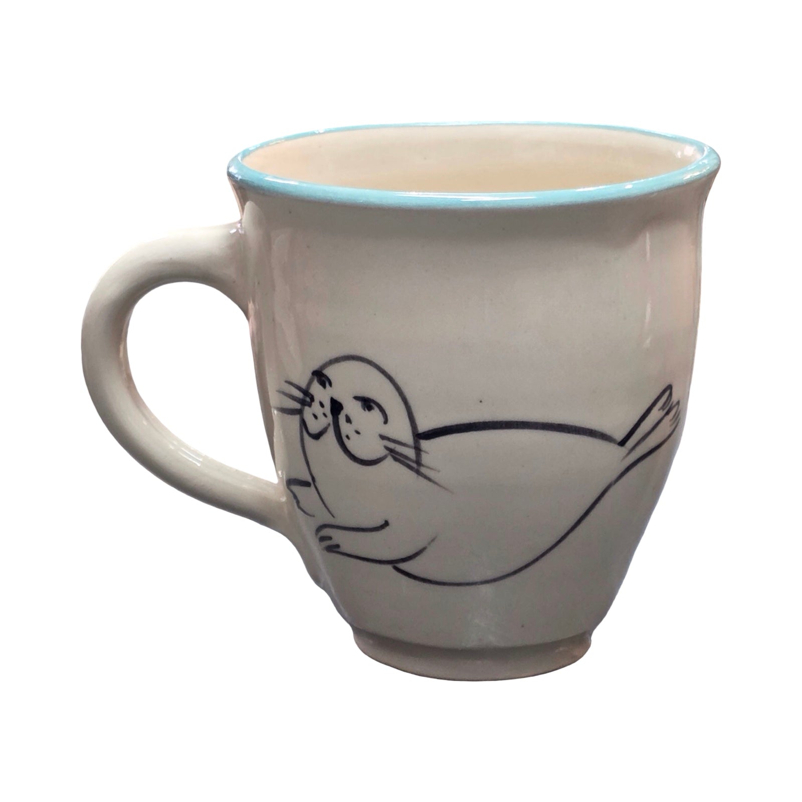 White mug with a blue rim and a seal design on a white background.