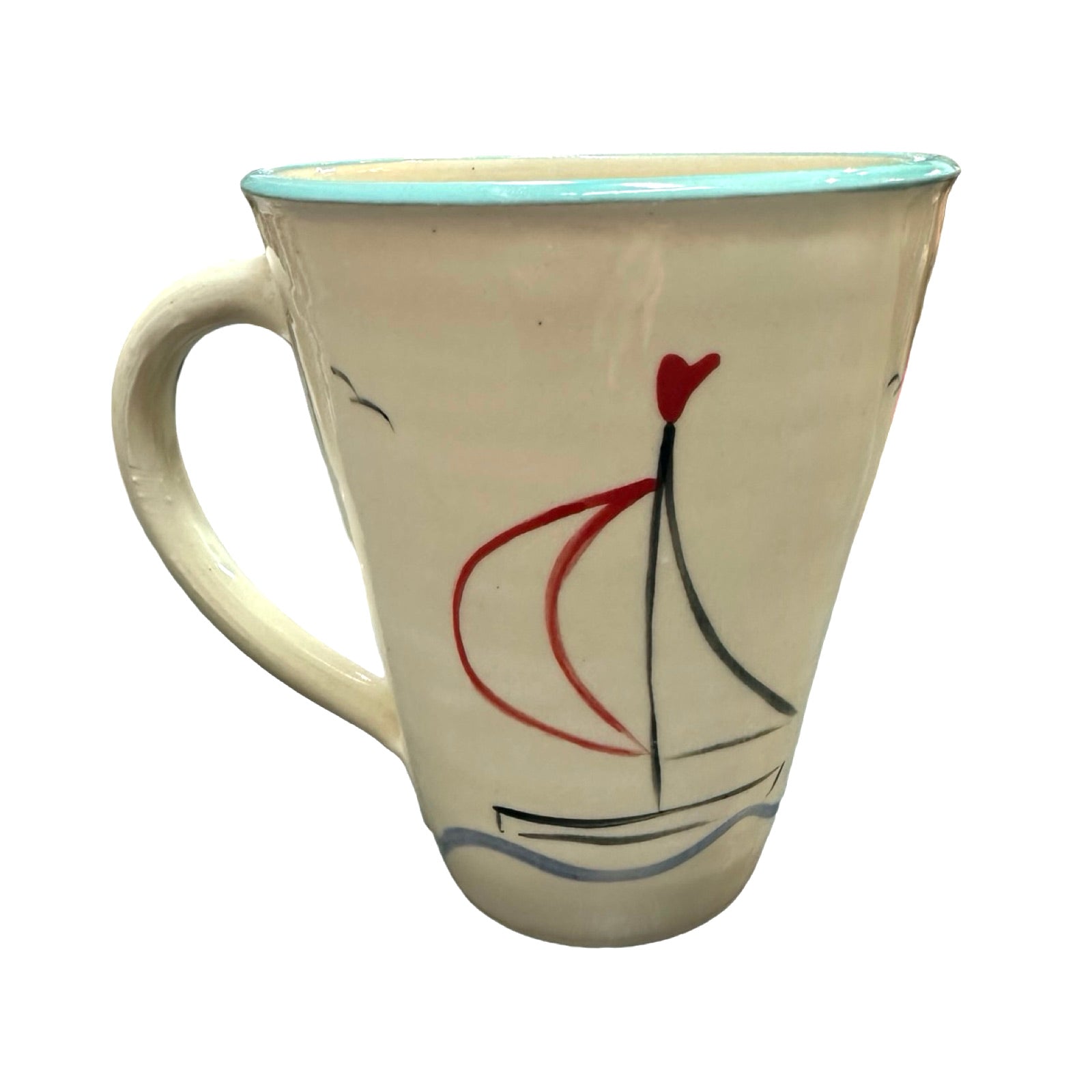 The back of a swimmer mug with an illustration of a sailboat in the sea.