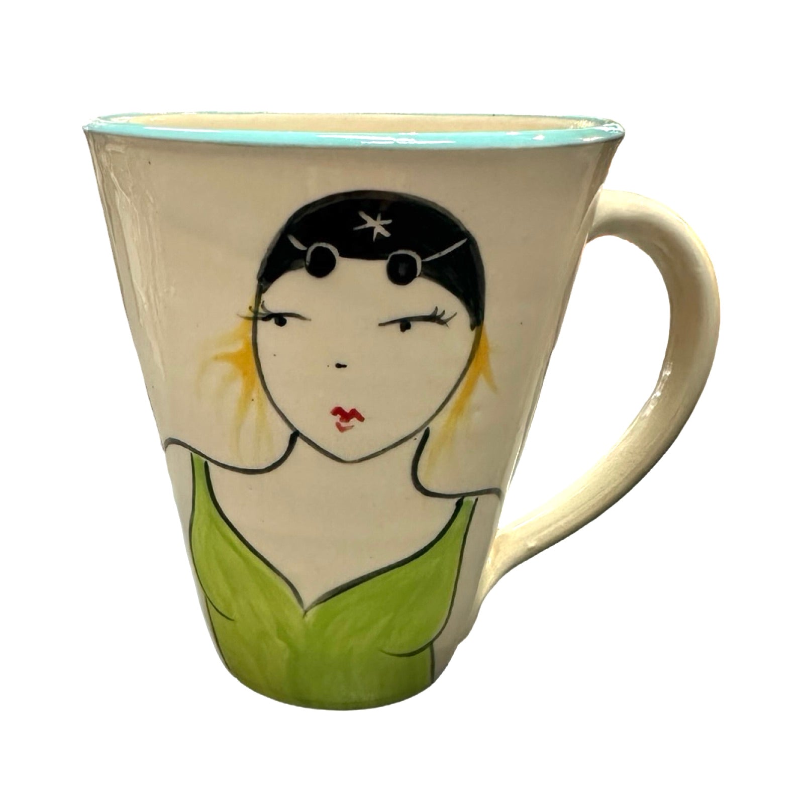 A cream coloured ceramic mug with a female wild swimmer wearing a green swimsuit and a black swim cap.