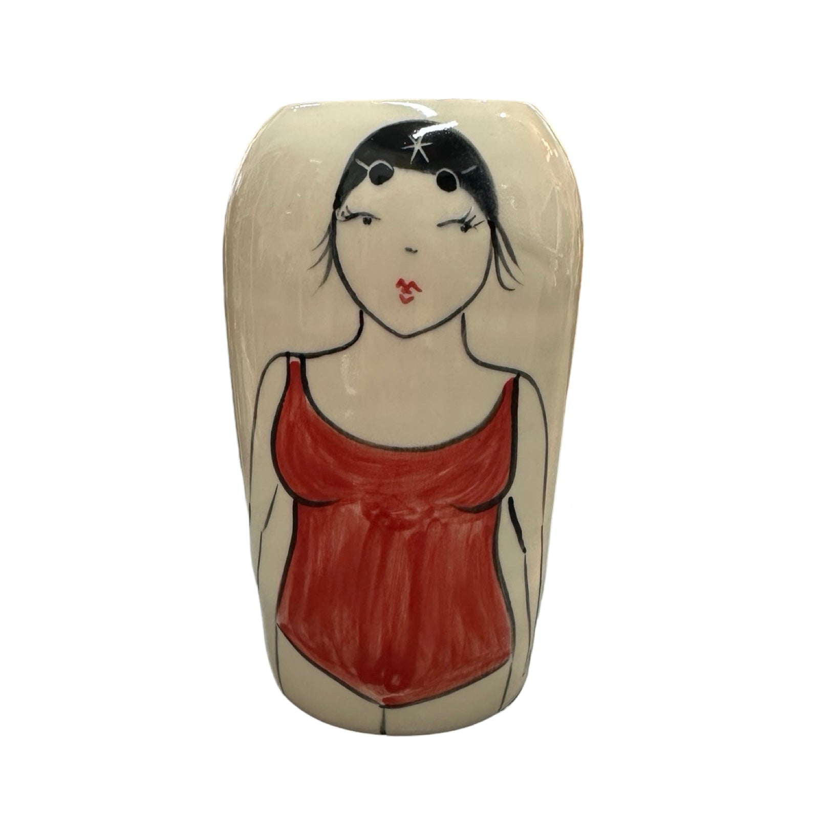 A cylindrical cream ceramic vase with a female wild swimmer on the front wearing a red swimsuit and a black swim cap.