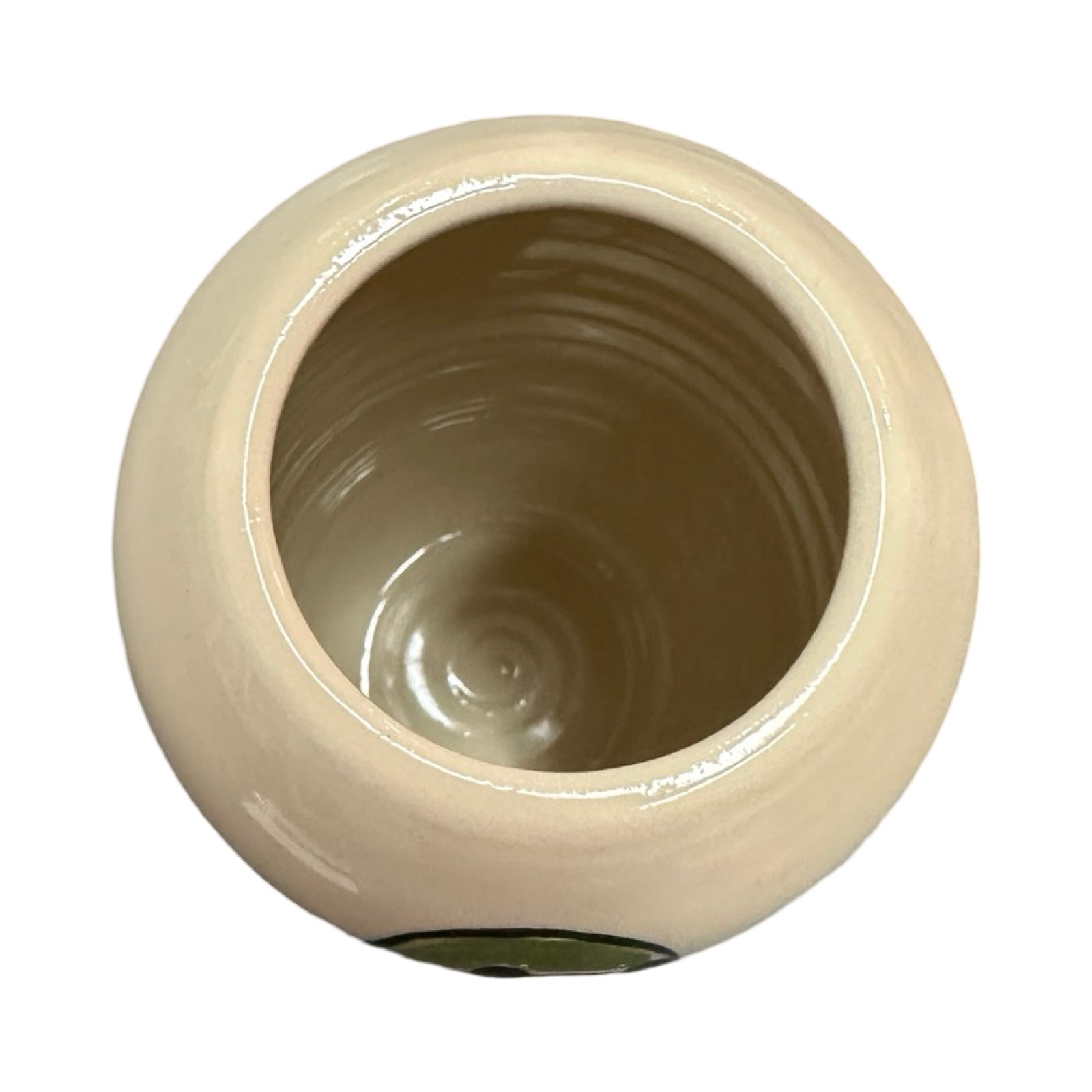 The top of a cylindrical cream ceramic vase.