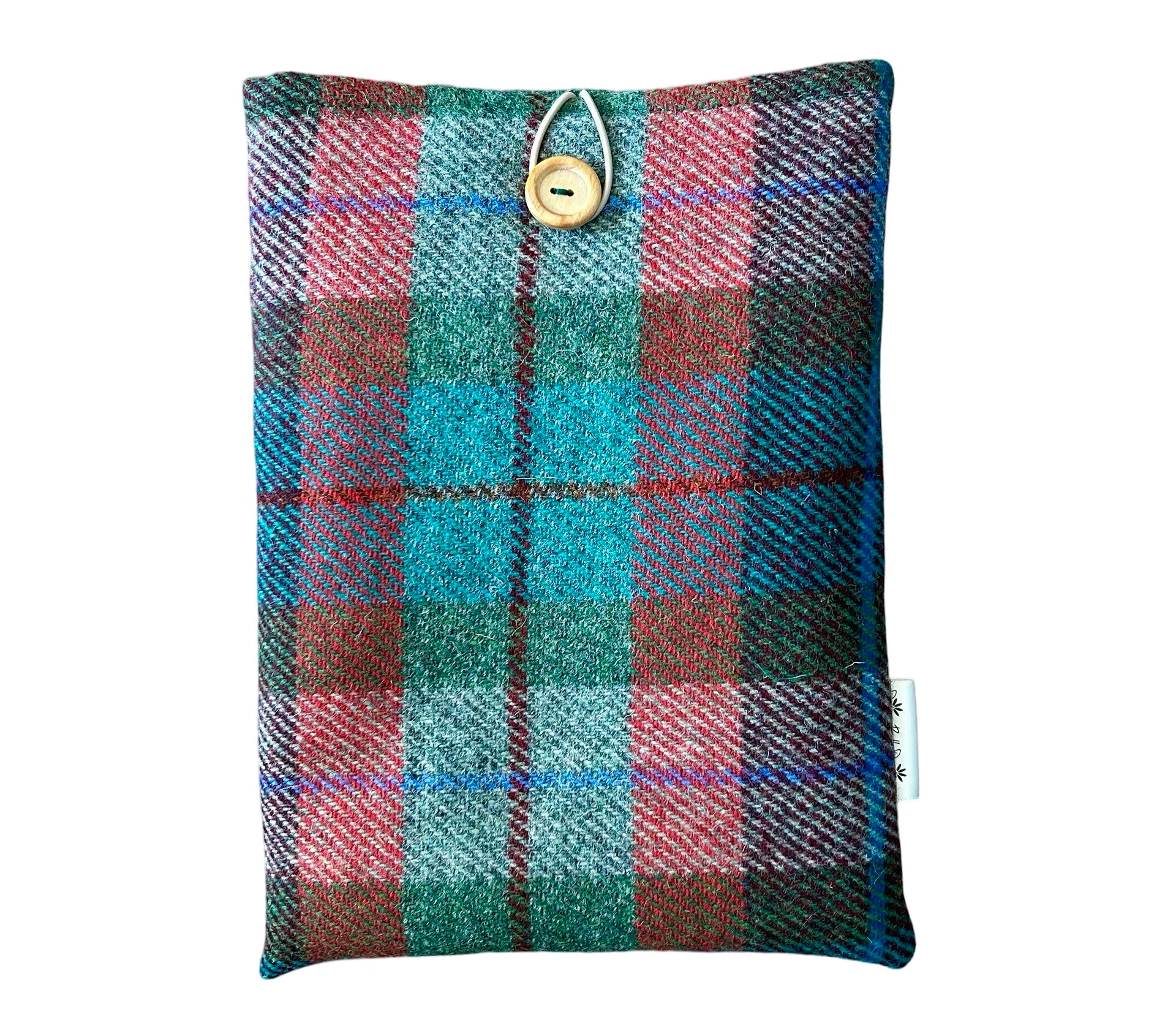 Red and green tartan check Harris tweed tablet sleeve. The sleeve closes at the top with a wooden button and elastic loop.