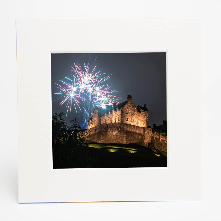 An image of Edinburgh Castle with fireworks above it in a square mount.