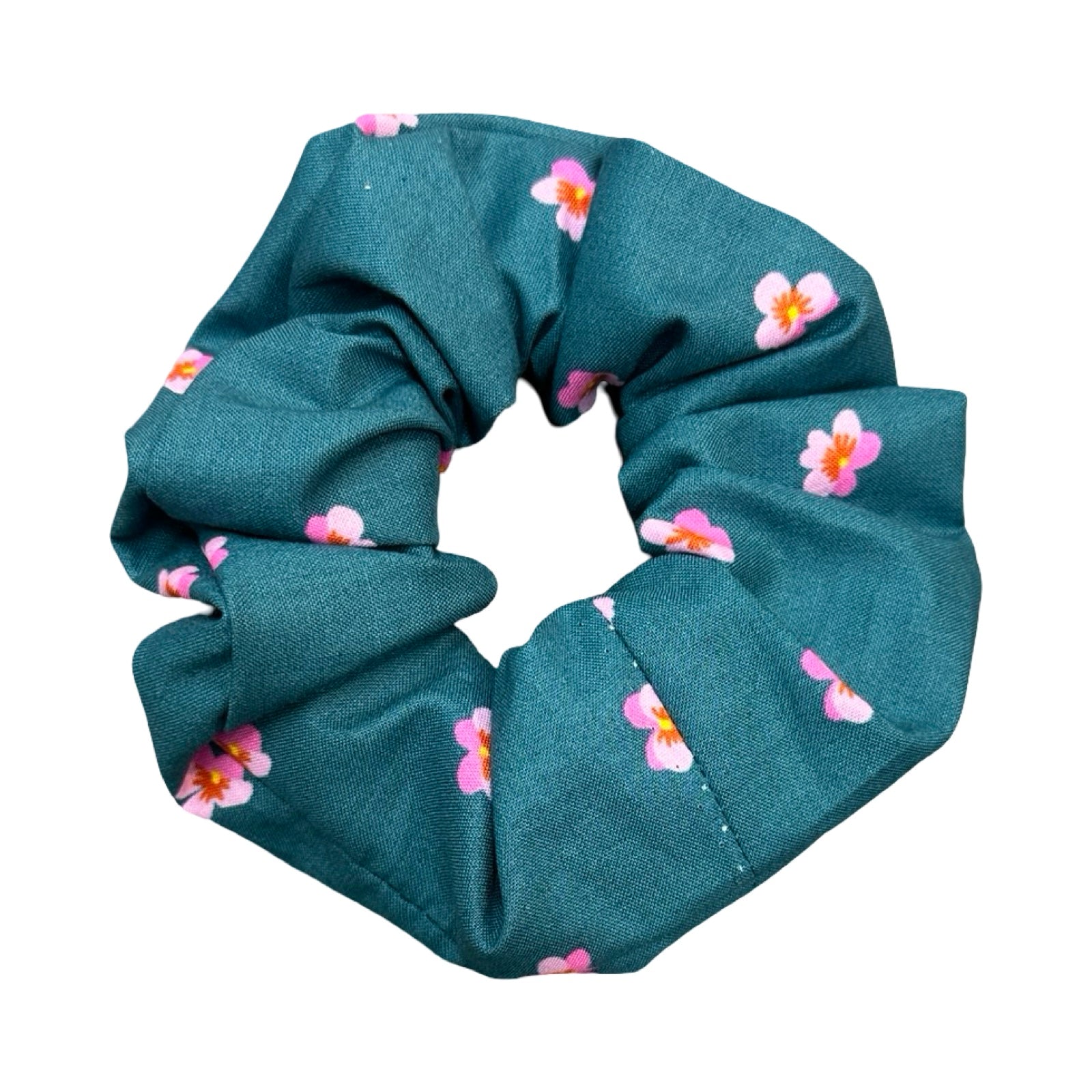 This teal handmade hair scrunchie is made from 100% cotton fabric with pink violets.