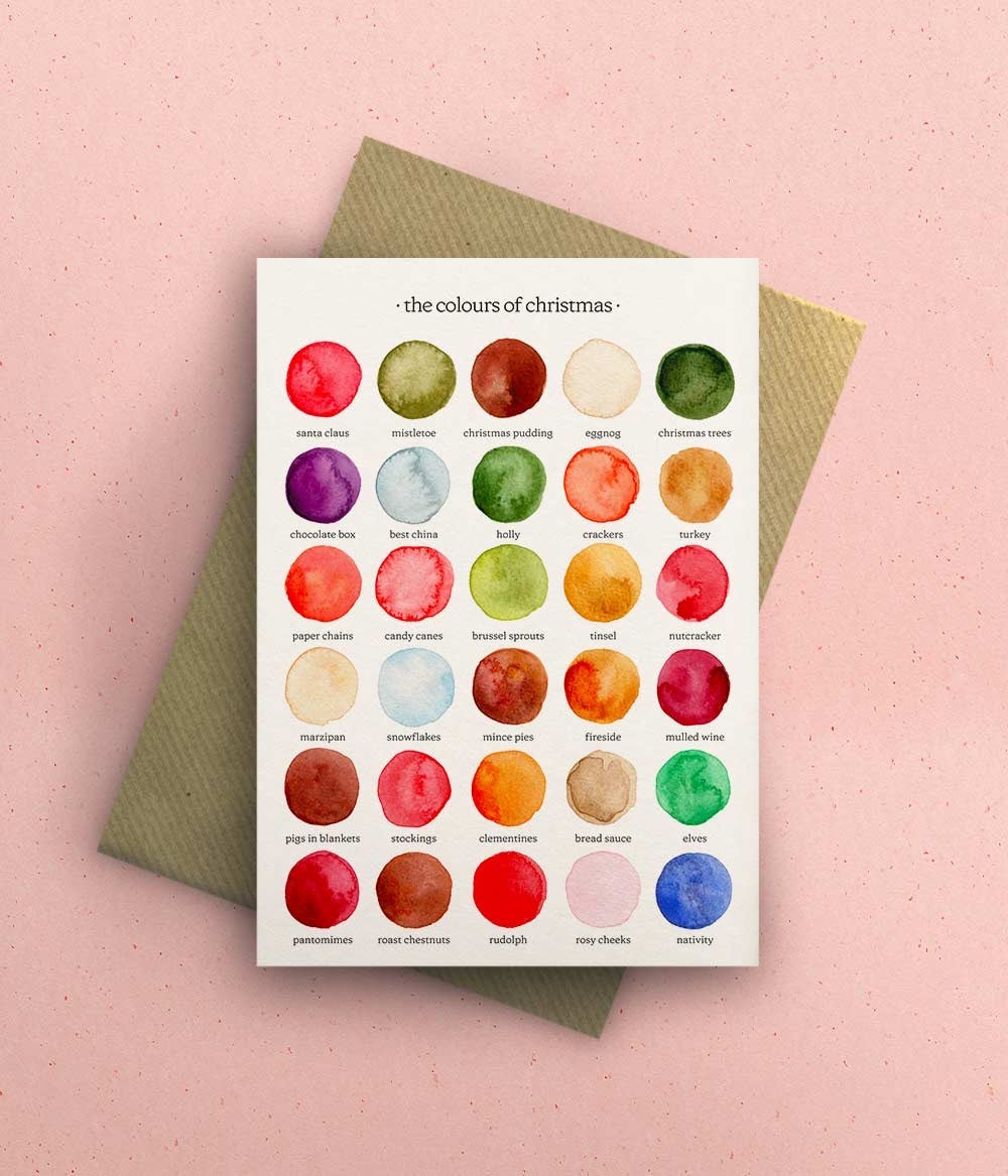 Color swatch chart with Christmas-themed names on a pink background.