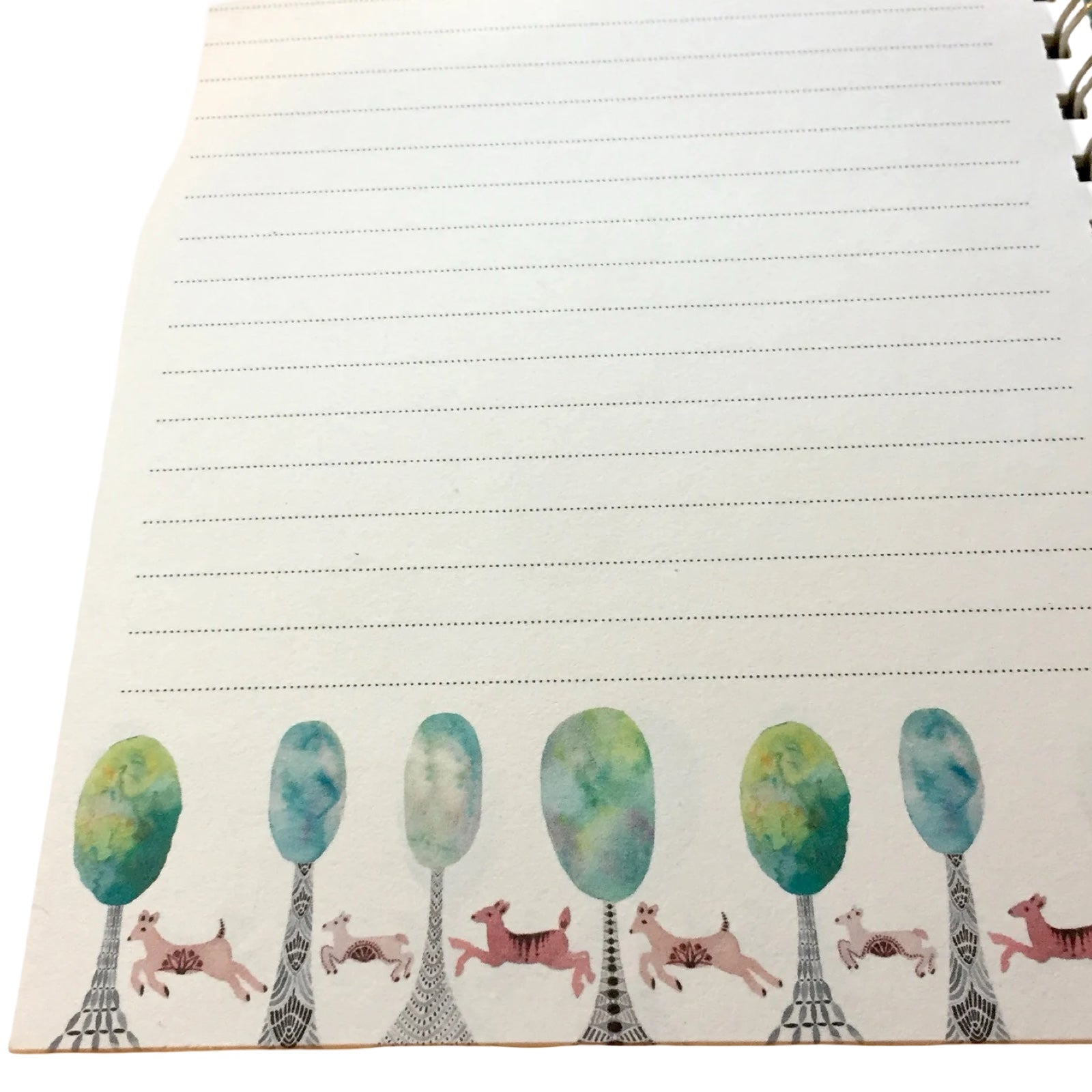 Notebook with trees and deer illustrations on a white background.