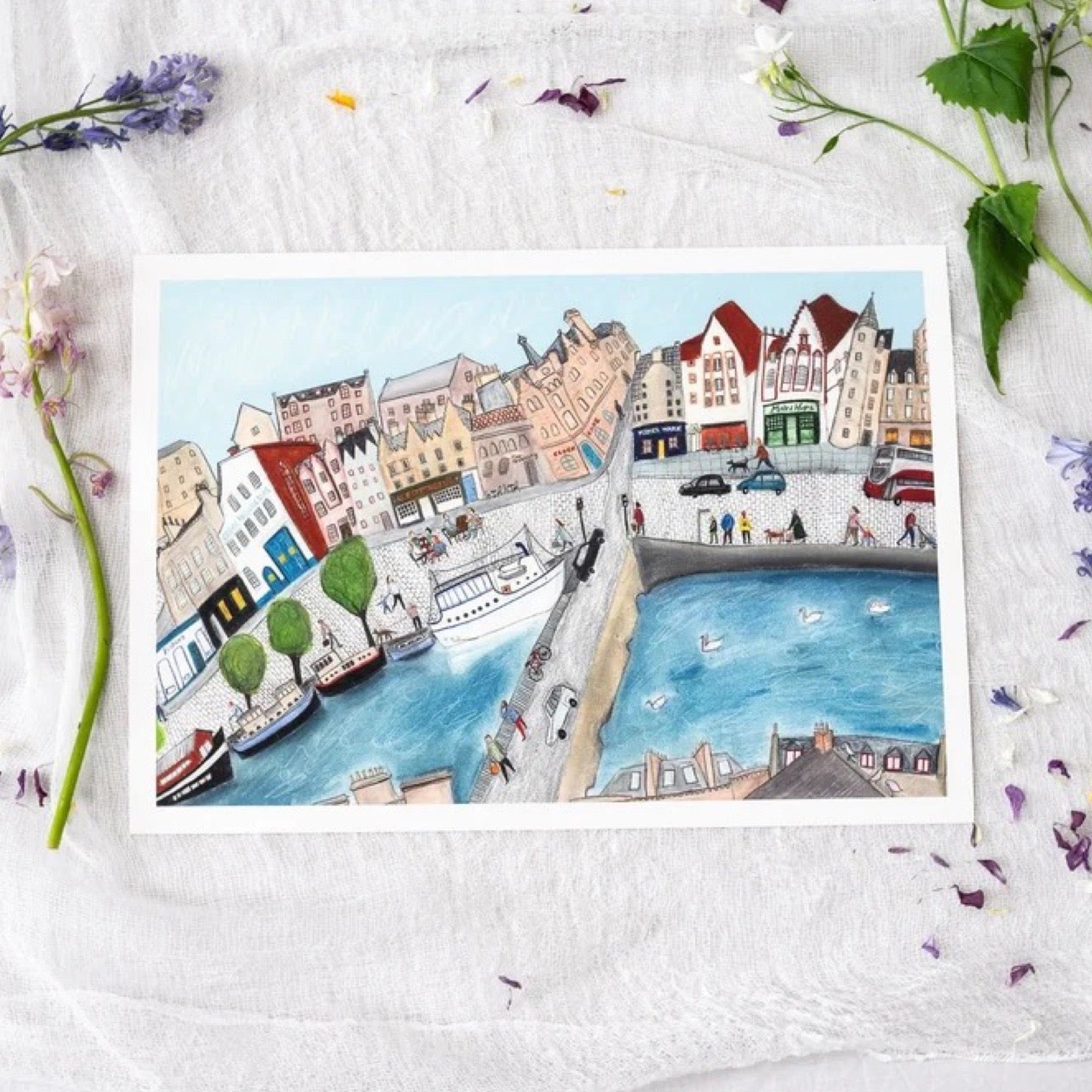 Illustration of a canal scene with buildings and boats on a white background with flowers.