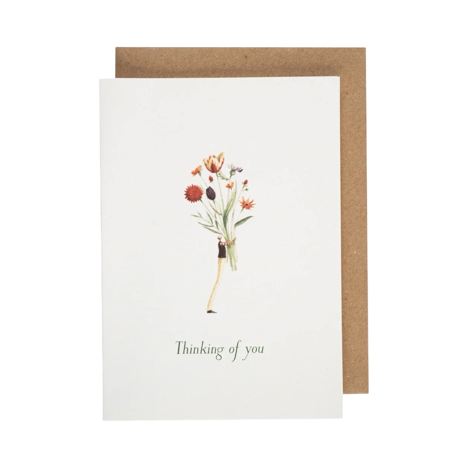 Greeting card with floral design and 'Thinking of you' text, brown envelope.