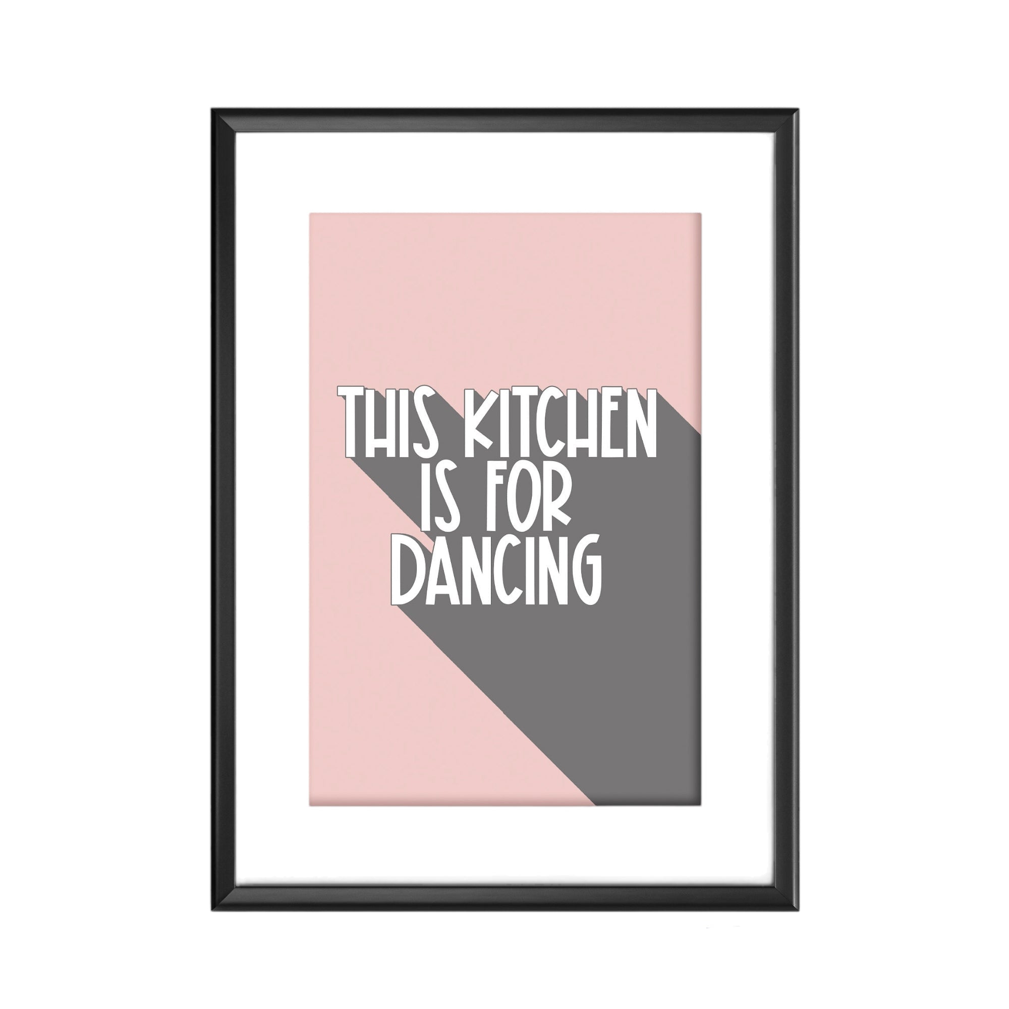 A print with the words this kitchen is for dancing in pink and grey.