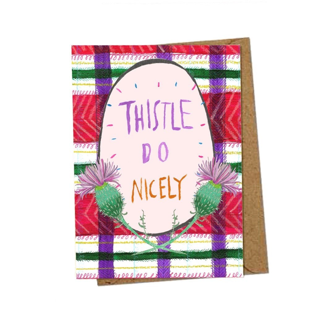 Scottish card with the text 'Thistle Do Nicely' inside a pink oval, framed by two thistles on a red, green and purple tartan background.
