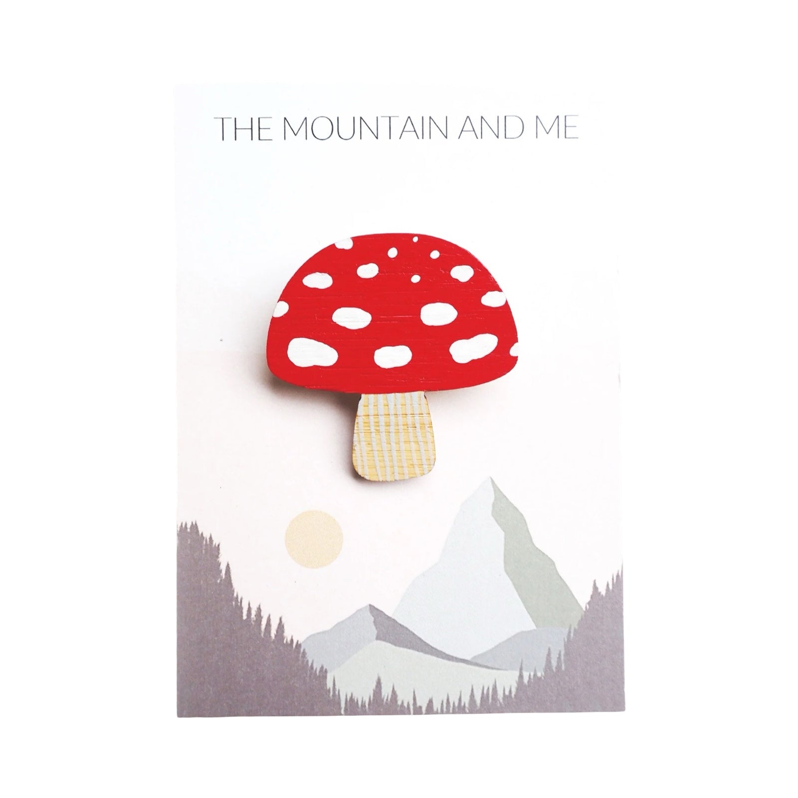 Toadstool-shaped brooch is made from lightweight and hardwearing bamboo, hand-painted in red and white and sealed with a water-based satin varnish, on backing card.