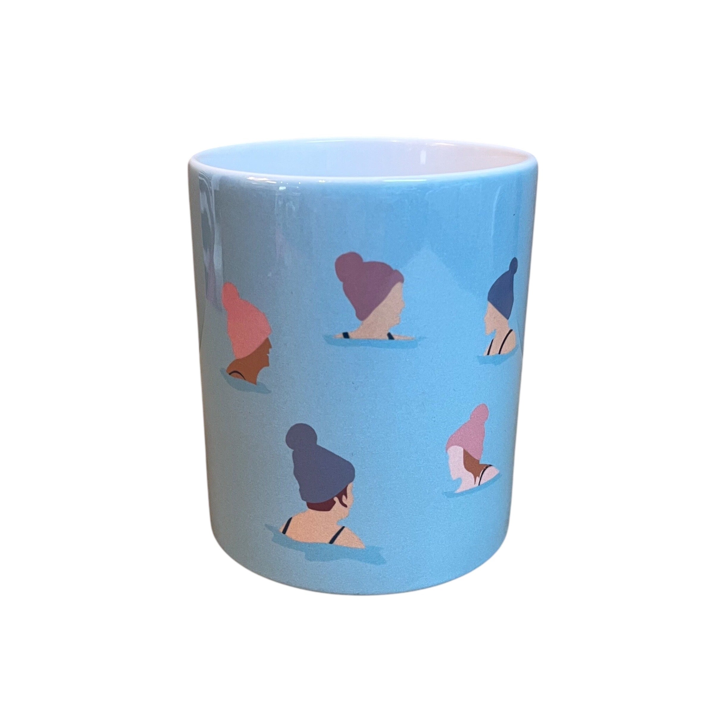 Mug featuring a group of wild swimmers in their woolly pom-pom hats up to their shoulders in the sea. This mug holds 10oz and is dishwasher safe.