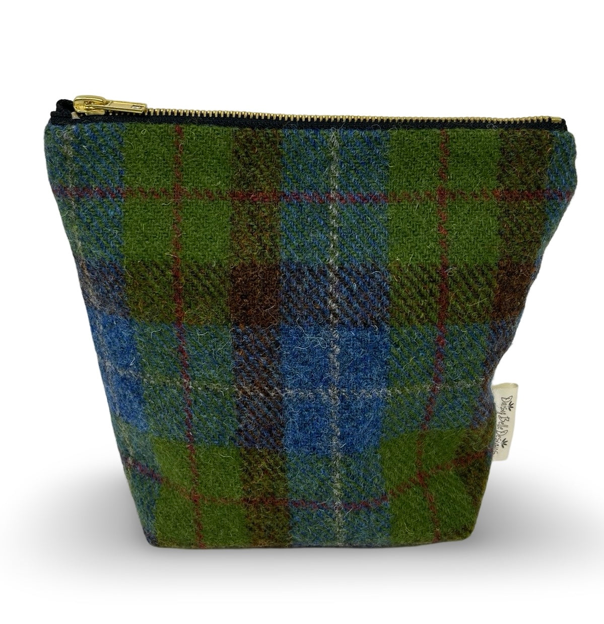 Toiletry or wash bag in dark blue and green check tweed with a gold coloured zip.