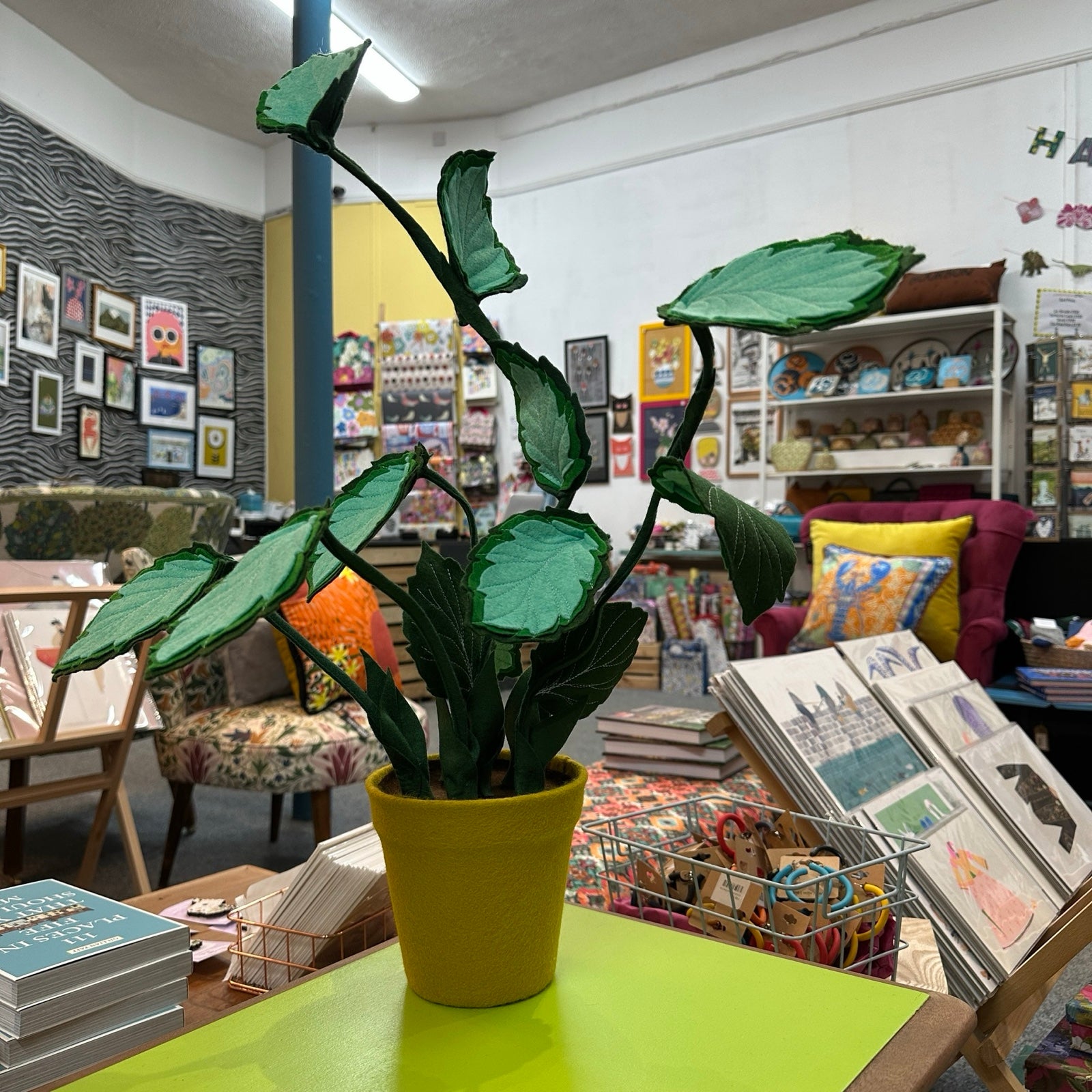 This trailing plant is made from felt, each leaf is hand-cut and unique, with a wire frame so the plant is completely posable.