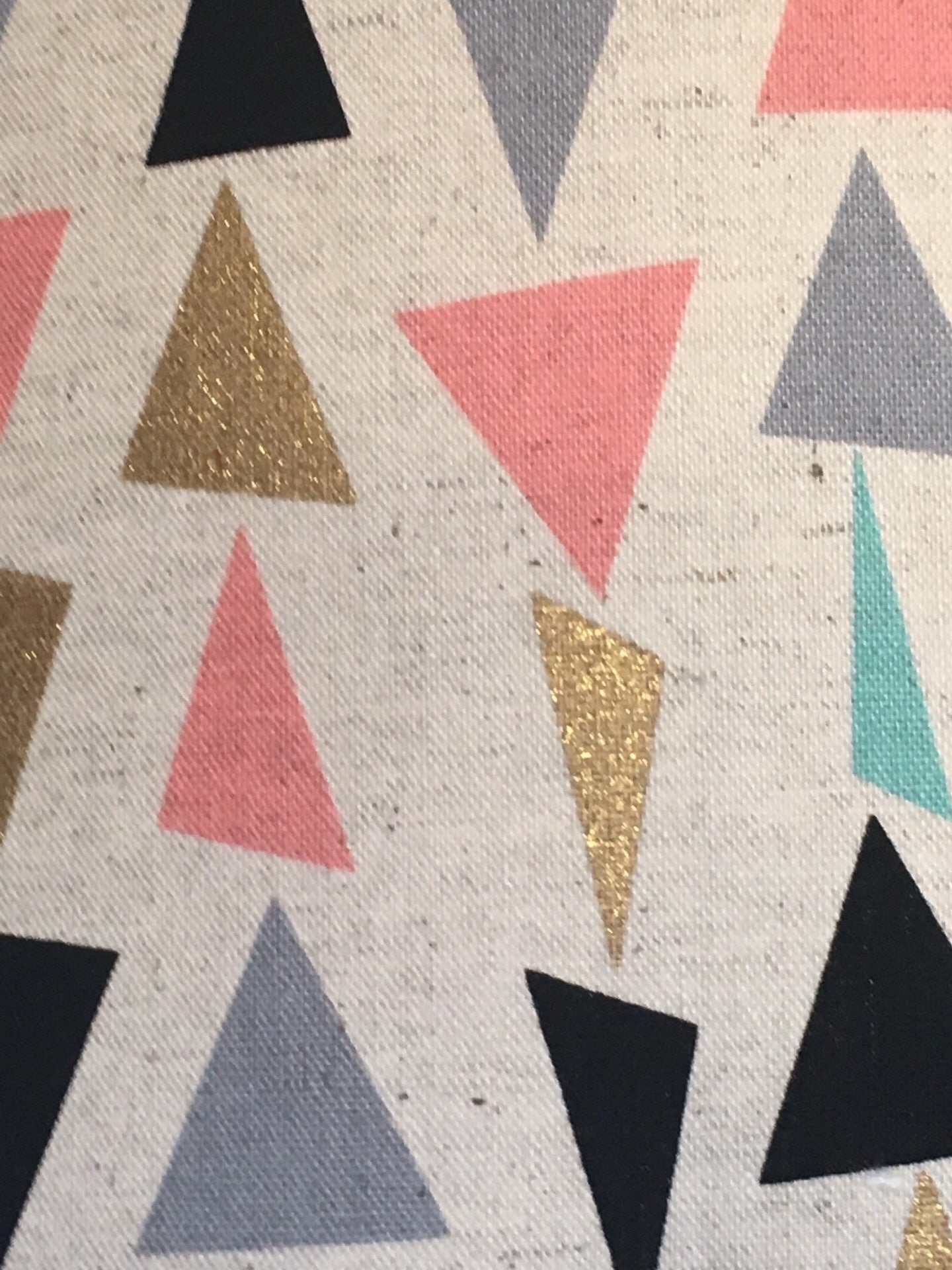 Cream fabric with mint, pink, black, grey and gold triangles