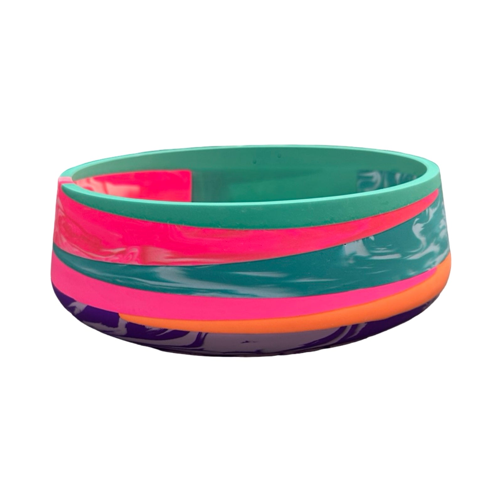 Colorful bowl with striped pattern on a white background.