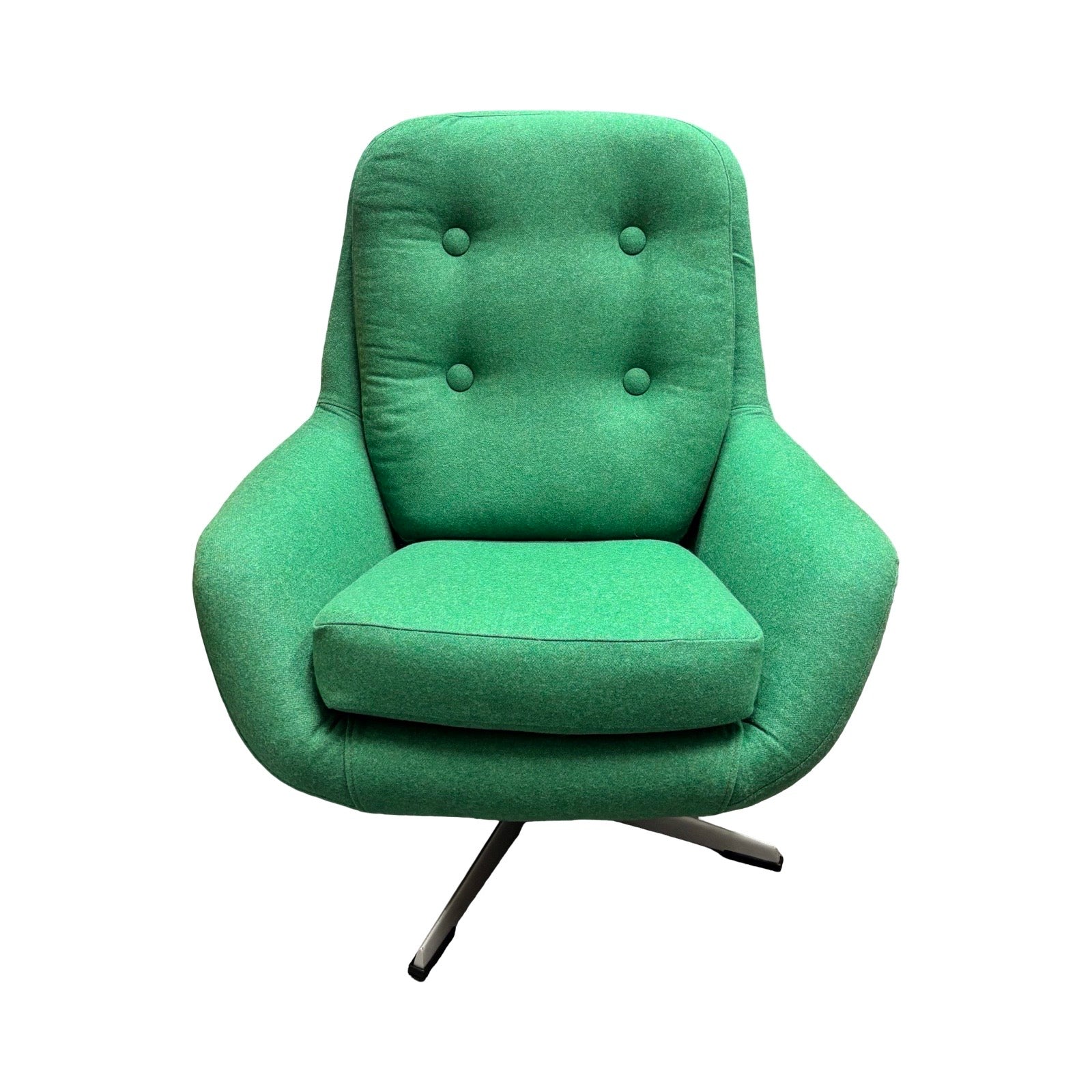 Green armchair with buttoned backrest on a white background.