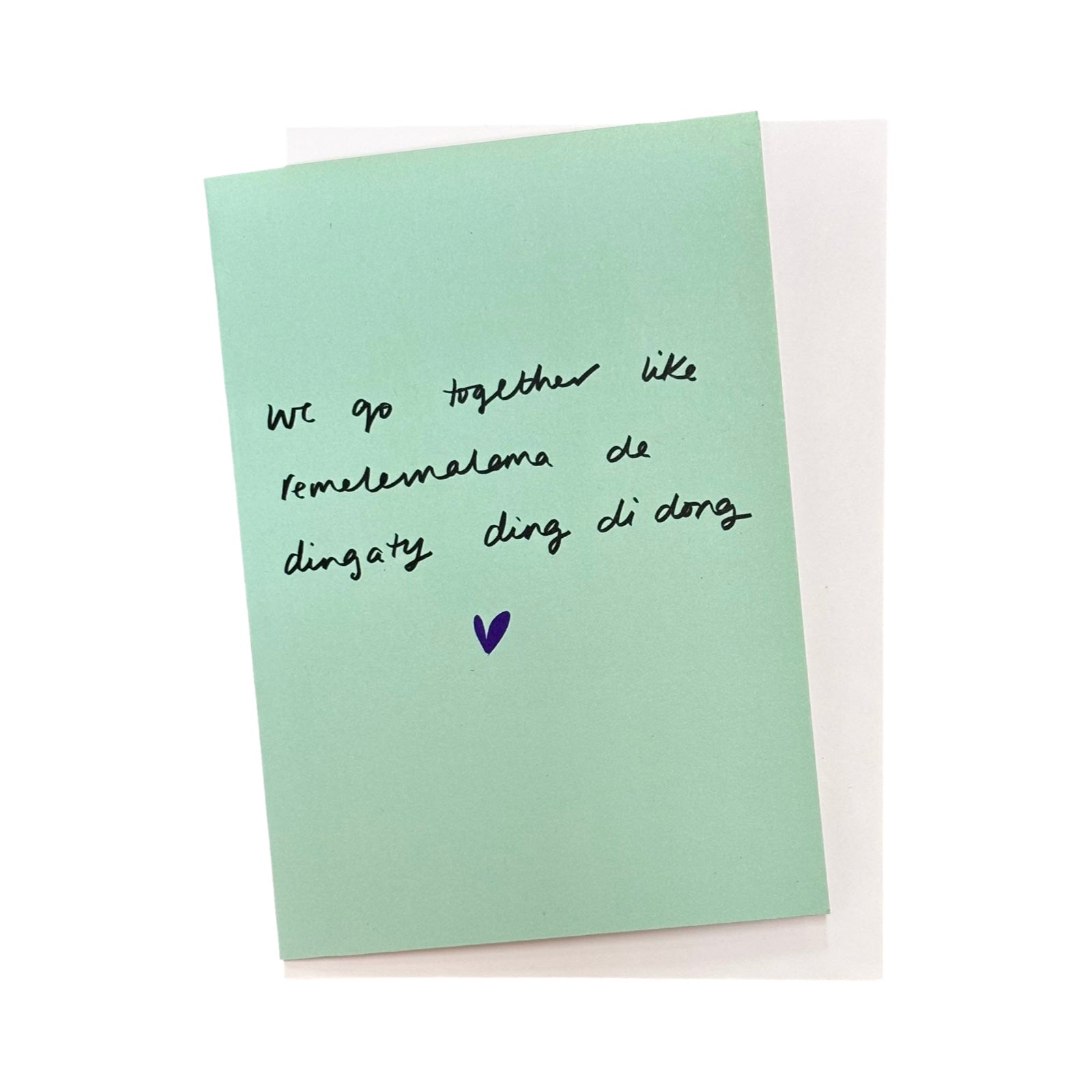Light green card with black text and a purple heart on a white background.