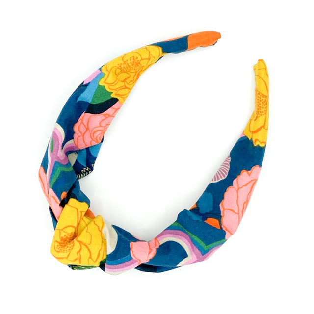 Colourful floral top knot Alice headbands made from 100% cotton fabrics.