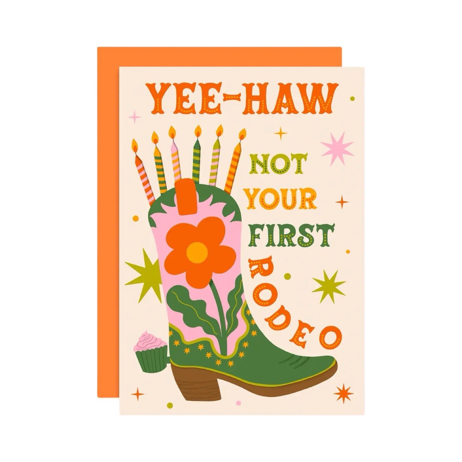 A birthday card featuring a green and pink cowboy boot with candles, and the text 'Yee-haw, not your first rodeo'.