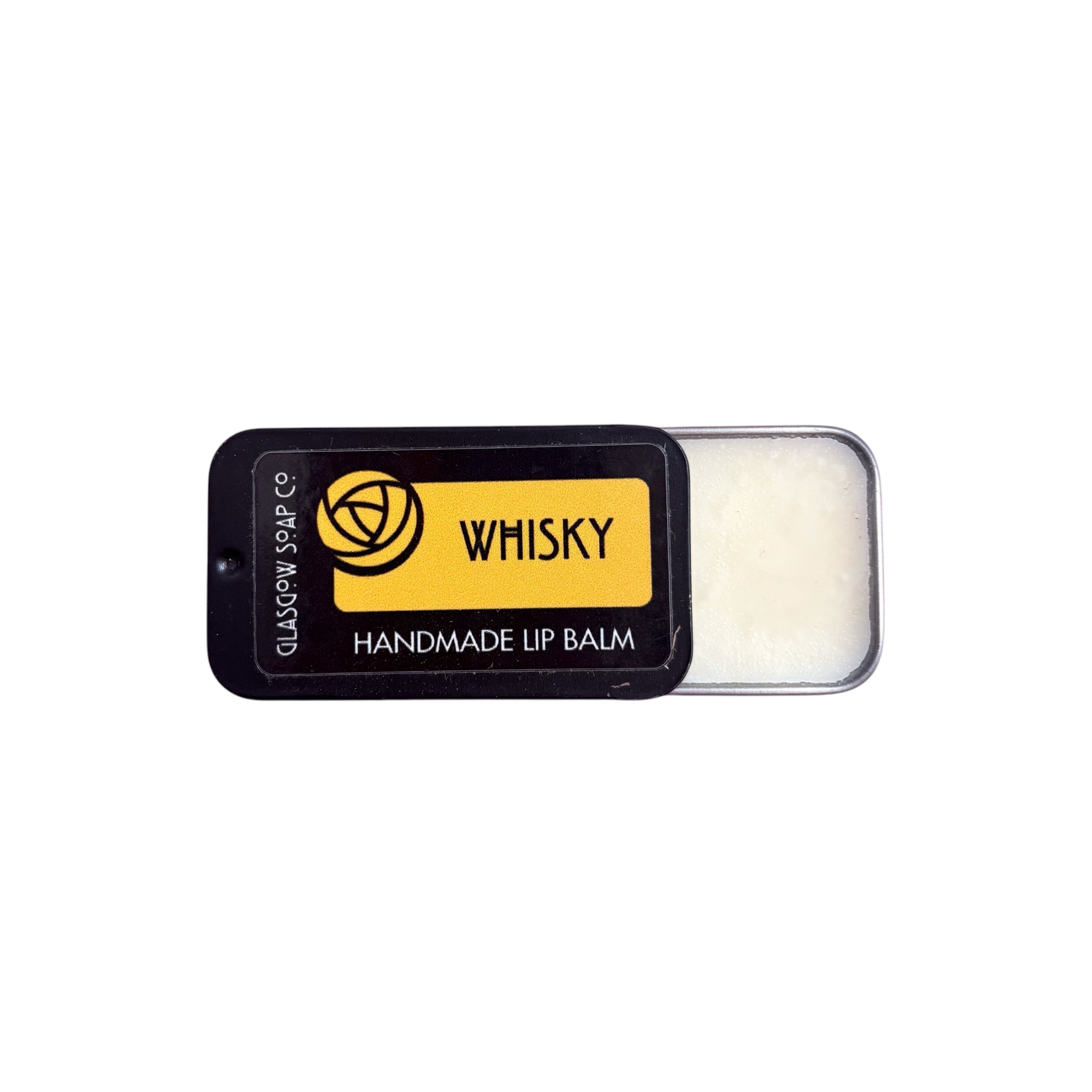 A small black tin of whisky lip balm, half open.