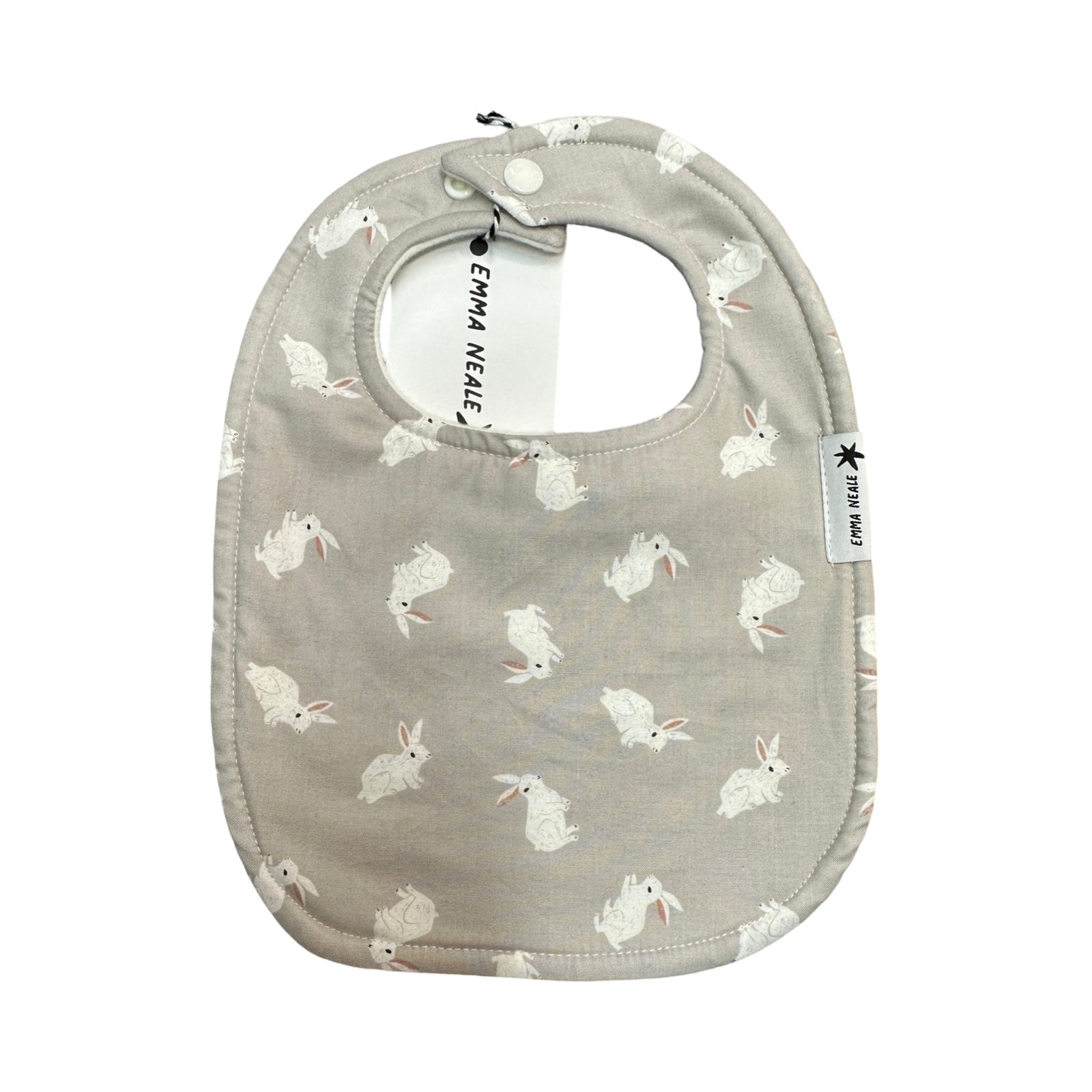 Traditional style bib in grey fabric with white rabbits.