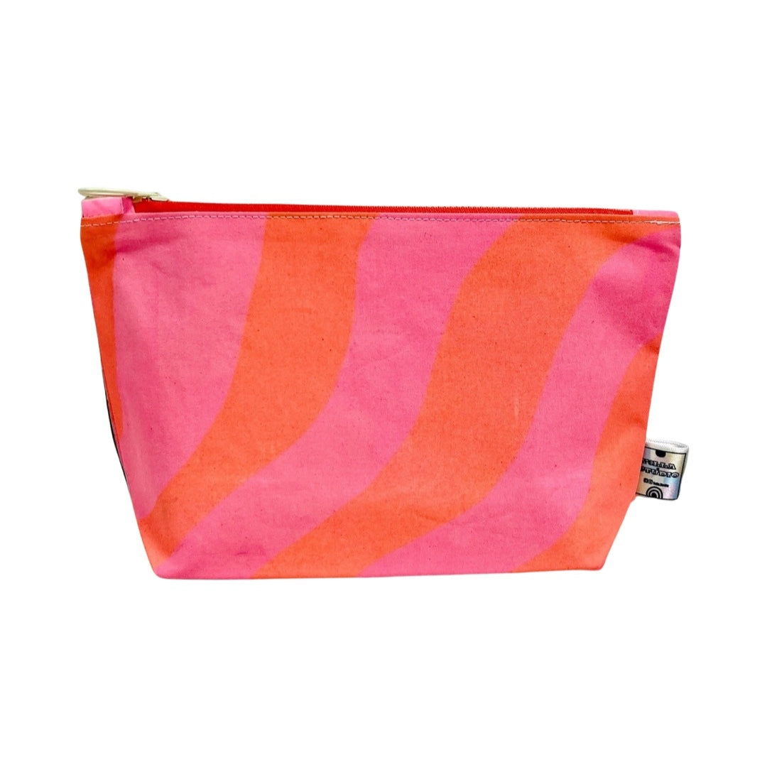 pink and orange wiggle pattern cosmetic bag.