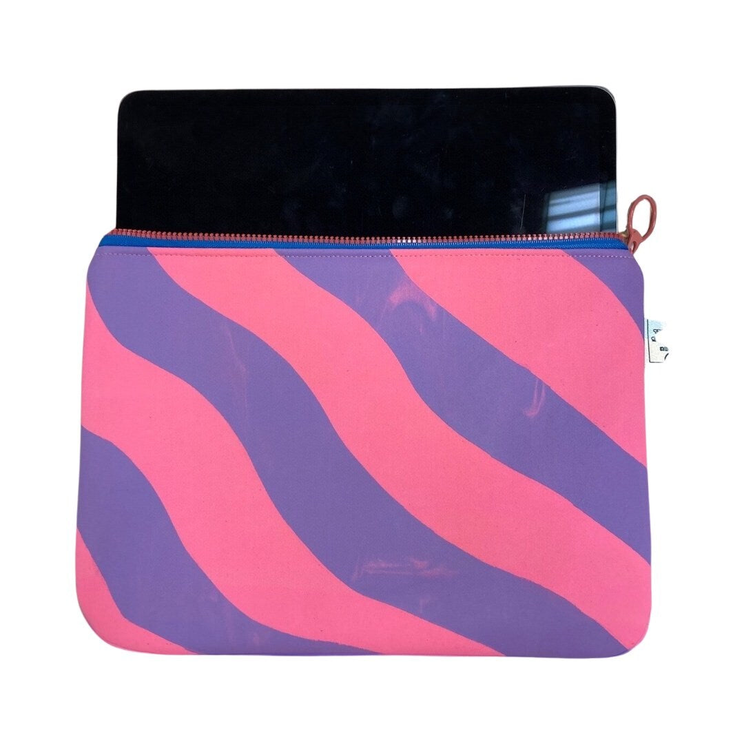 Pink and purple iPad case in a wiggle design with iPad.