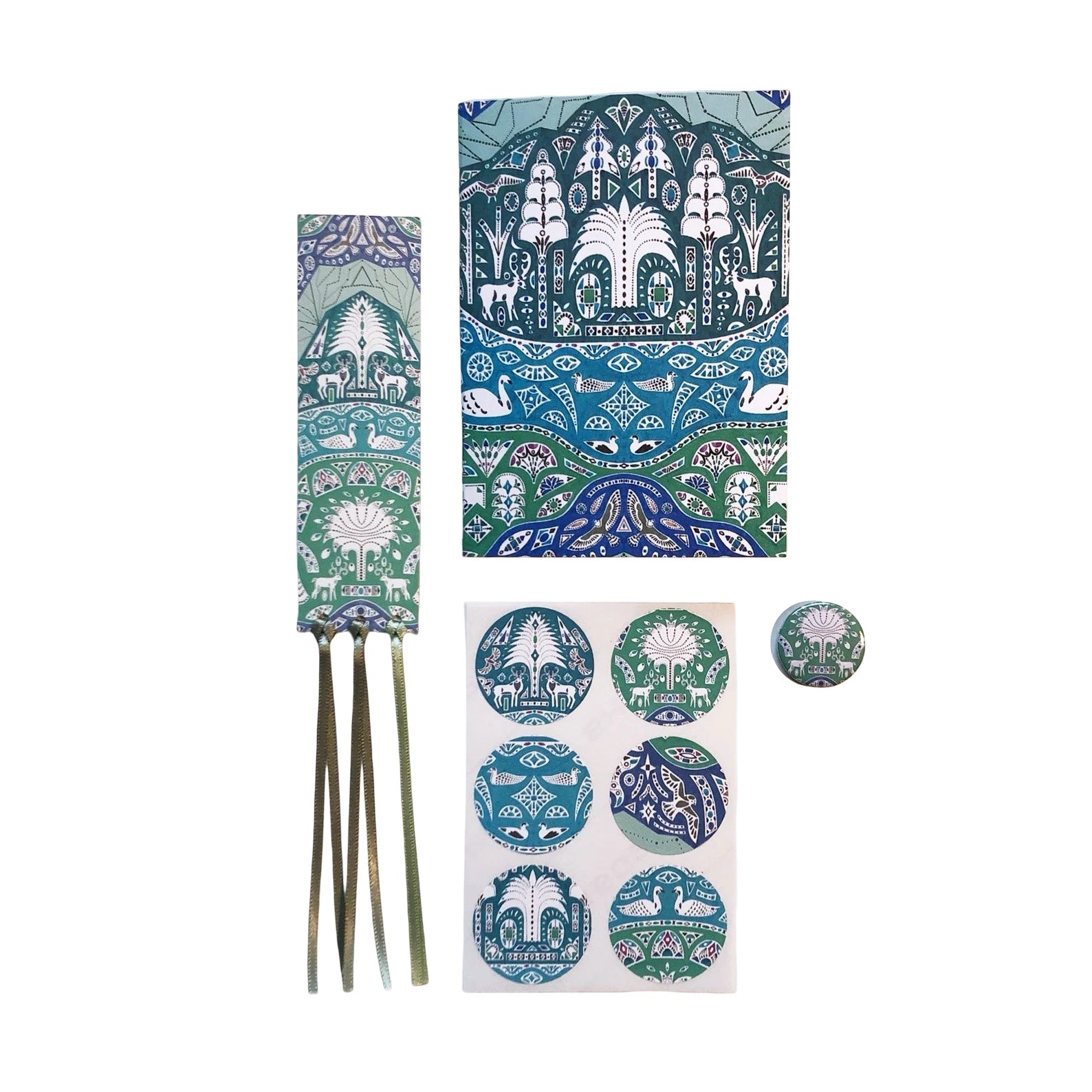 Set of decorative stationary items with nature-themed designs on a white background.