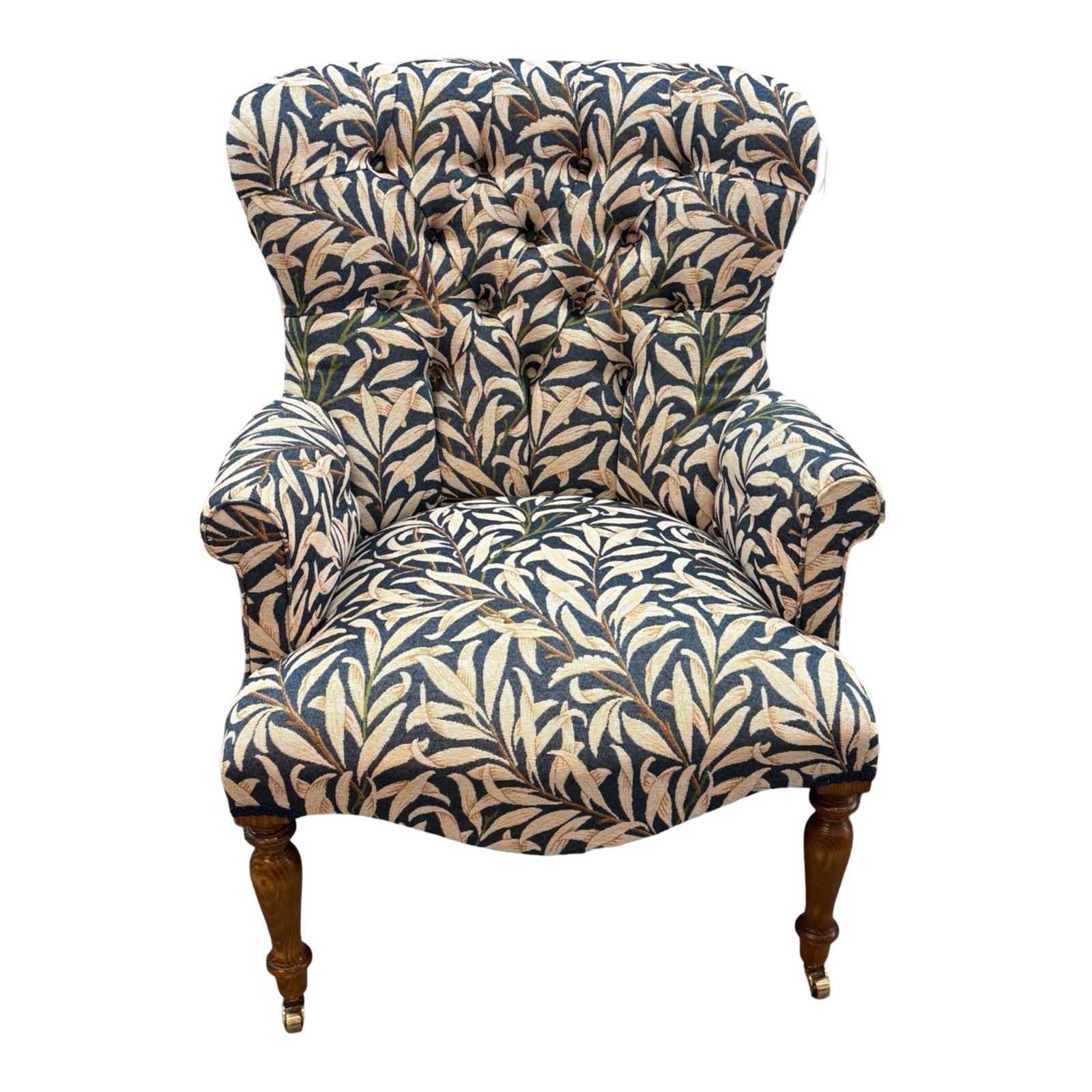 A hand-crafted occasional armchair in blue and cream William Morris Willow Bough tapestry style fabric.