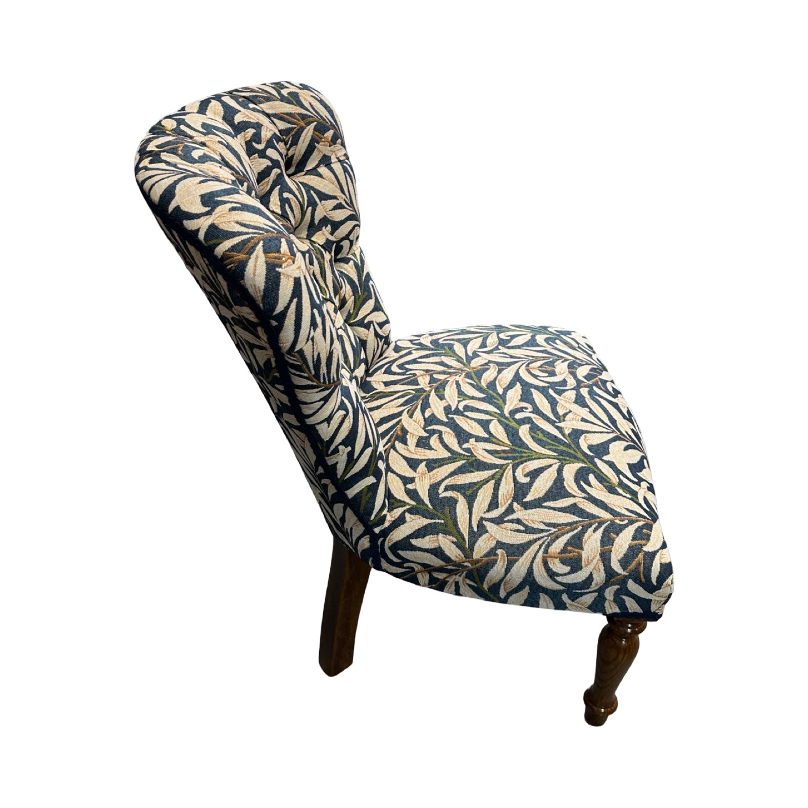 Chair with leaf pattern on a white background.