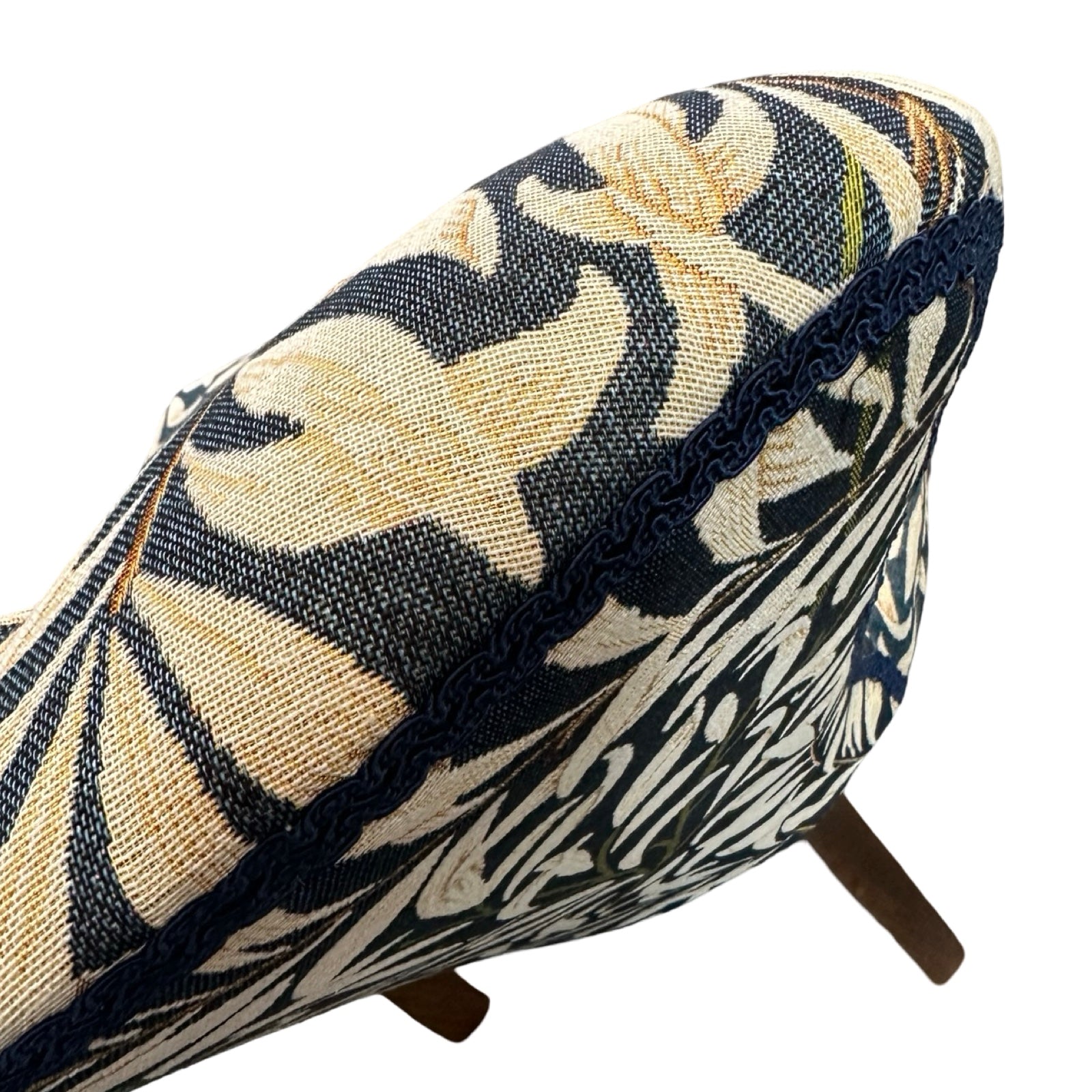 Decorative cushion with floral pattern on a white background