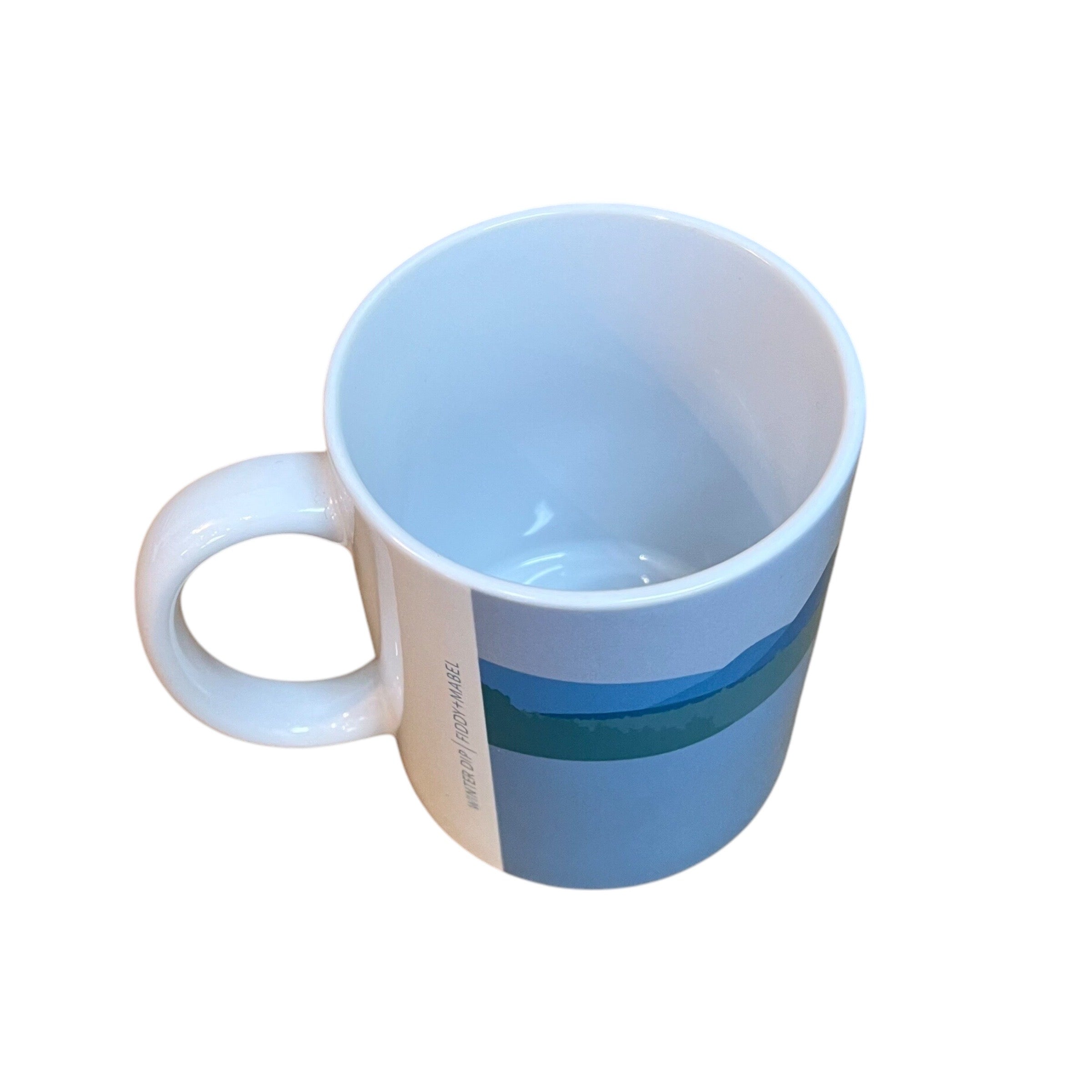 Mug featuring a male wild swimmer wearing a woolly hat up to his thighs in the water. Perfect for wild swimming fans. This mug holds 10oz and is dishwasher safe.
