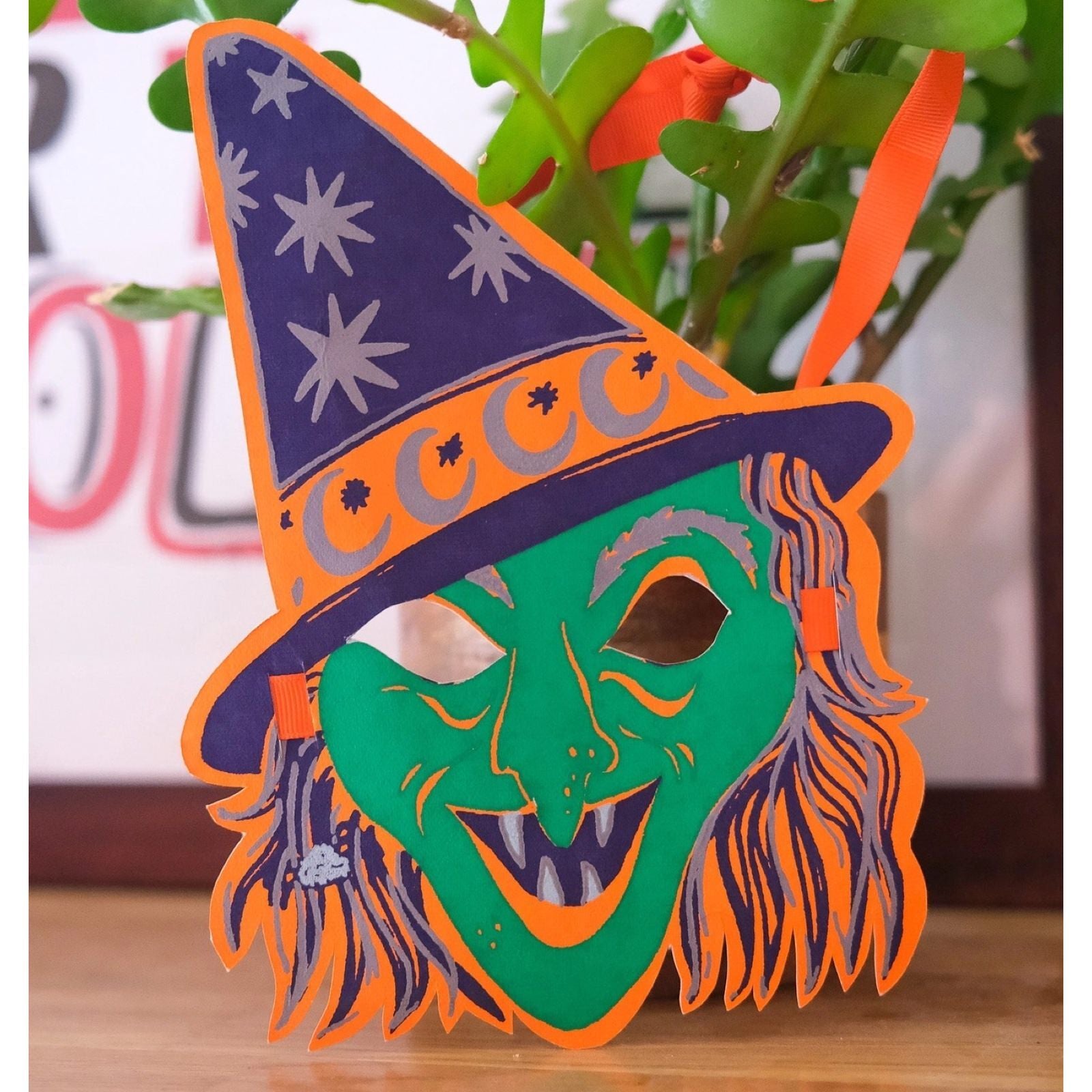Green, orange and purple witch halloween face mask