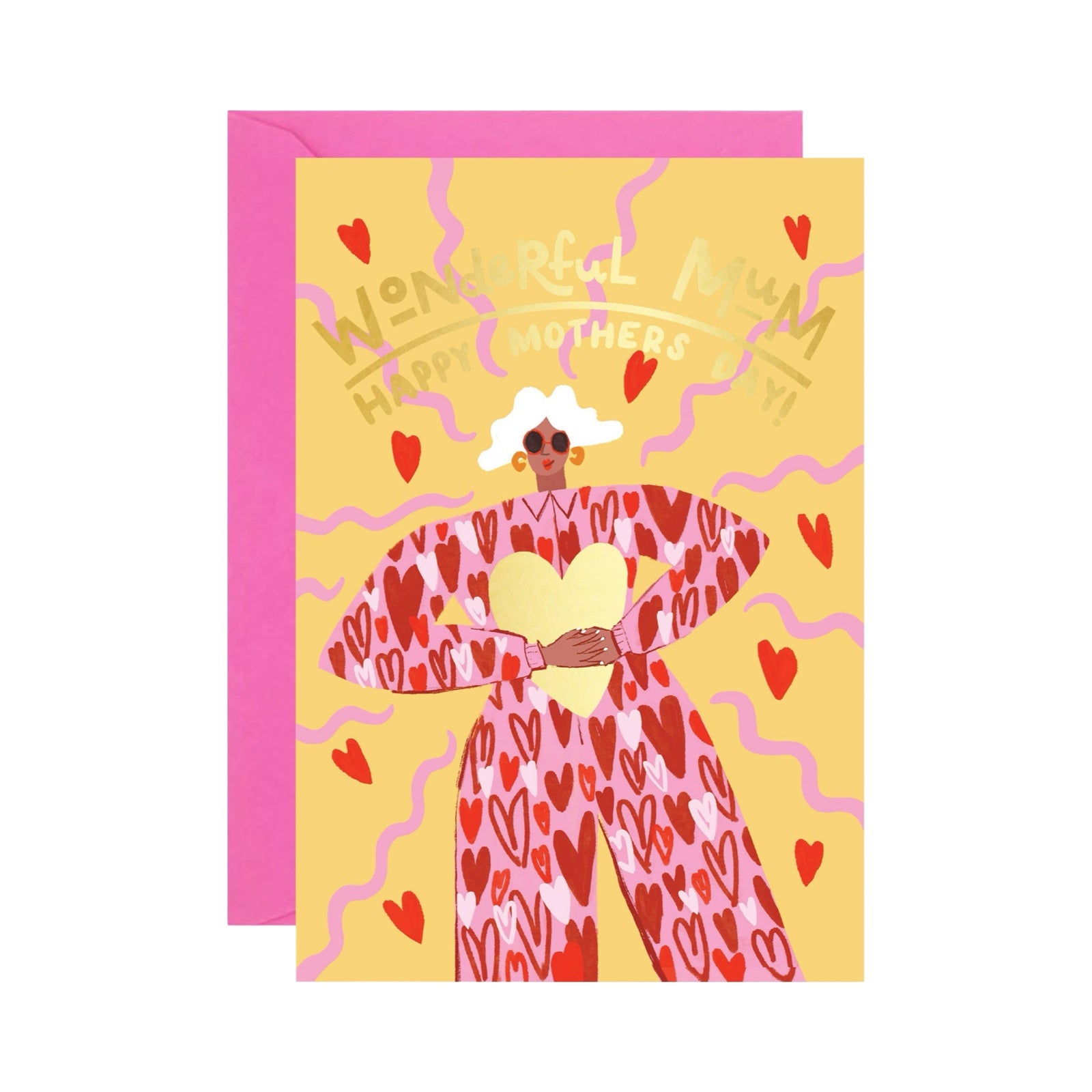 Mother's Day card featuring an illustration of a fabulous mum with white hair, wearing a red jumpsuit covered in love hearts, holding a giant gold love heart. The text 'Wonderful Mum, Happy Mother's Day' is written in gold.