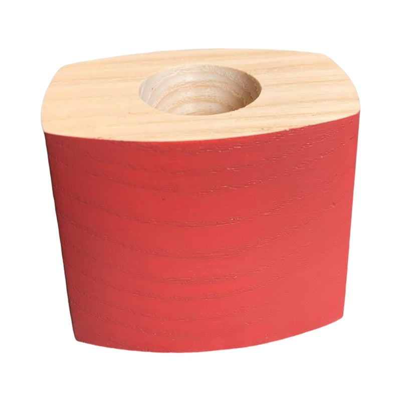 Red wooden candle holder.